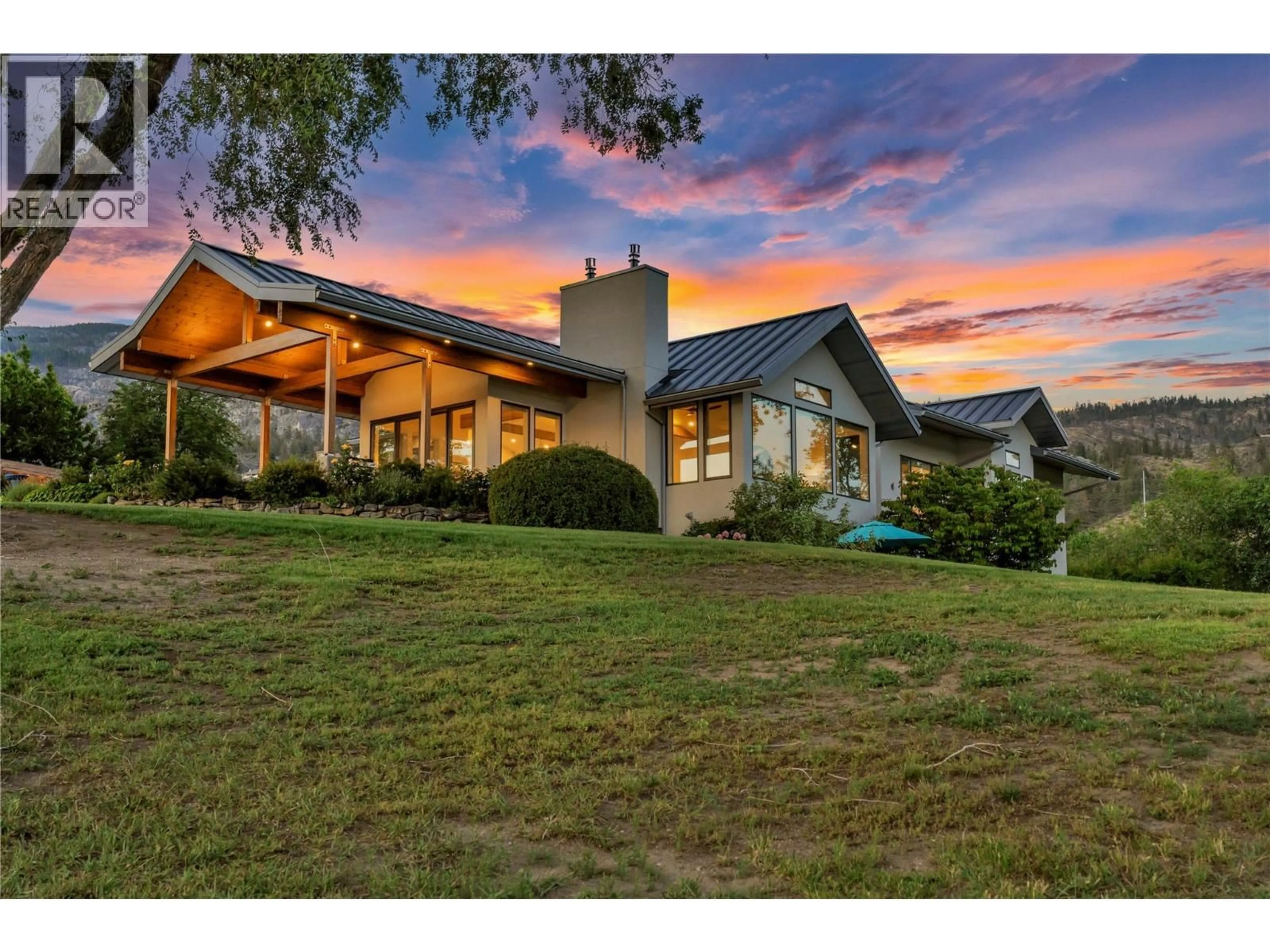 A pic from outside/outdoor area/front of a property/back of a property/a pic from drone, mountain view for 320 PARSONS ROAD, Okanagan Falls British Columbia V0H1R3