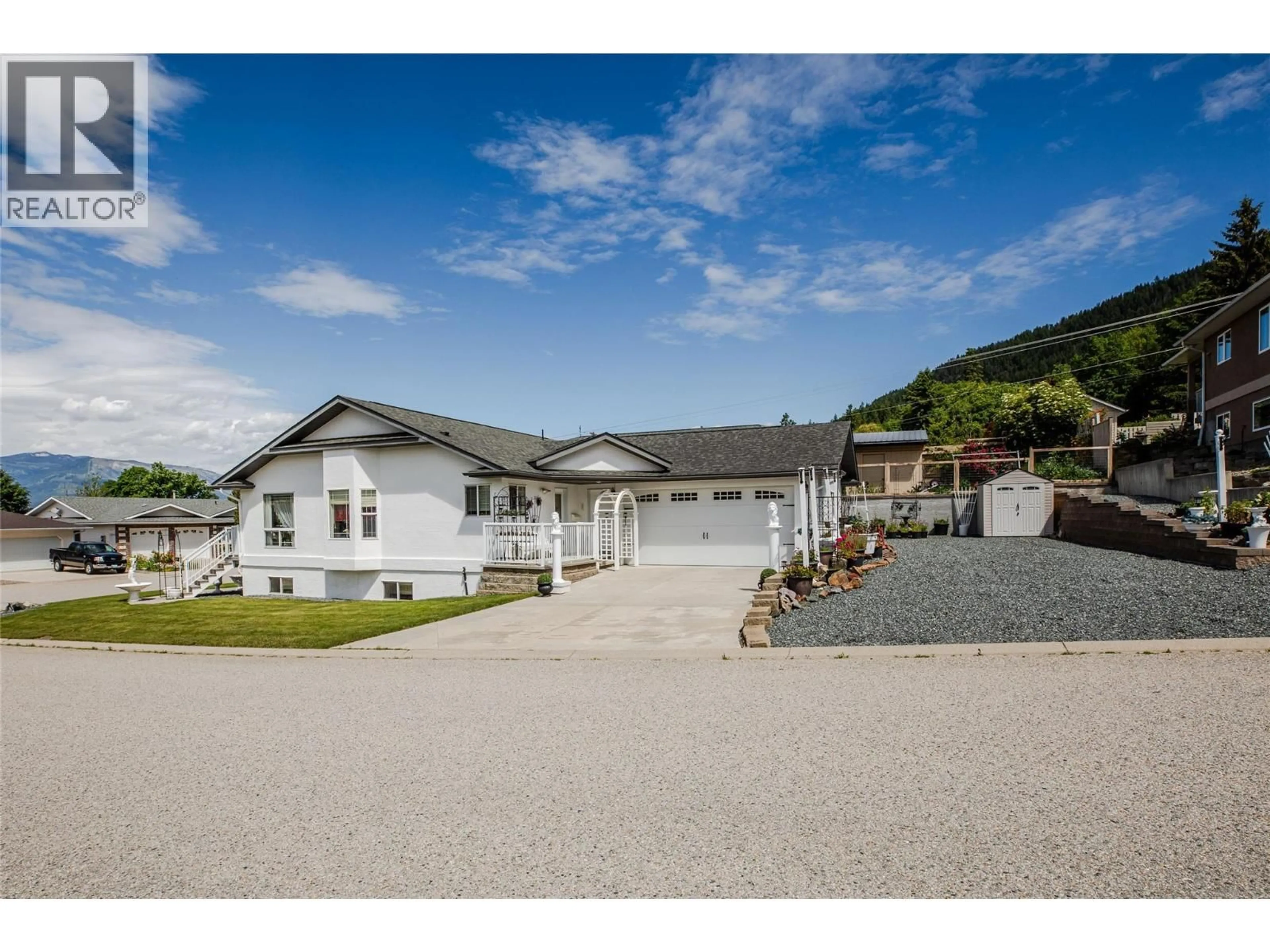 A pic from outside/outdoor area/front of a property/back of a property/a pic from drone, mountain view for 1038 11TH AVENUE NORTH, Creston British Columbia V0B1G6