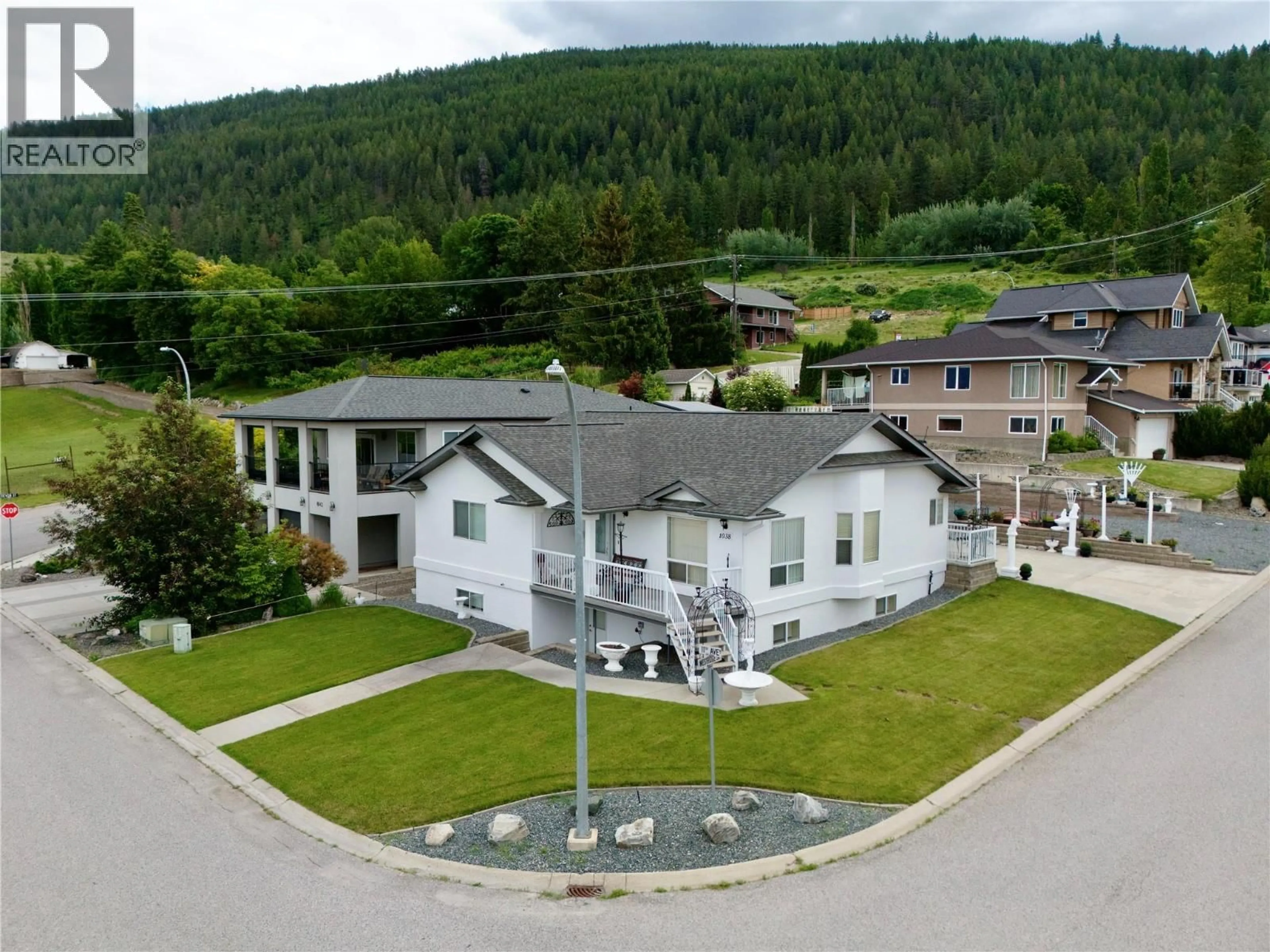 A pic from outside/outdoor area/front of a property/back of a property/a pic from drone, mountain view for 1038 11TH AVENUE NORTH, Creston British Columbia V0B1G6