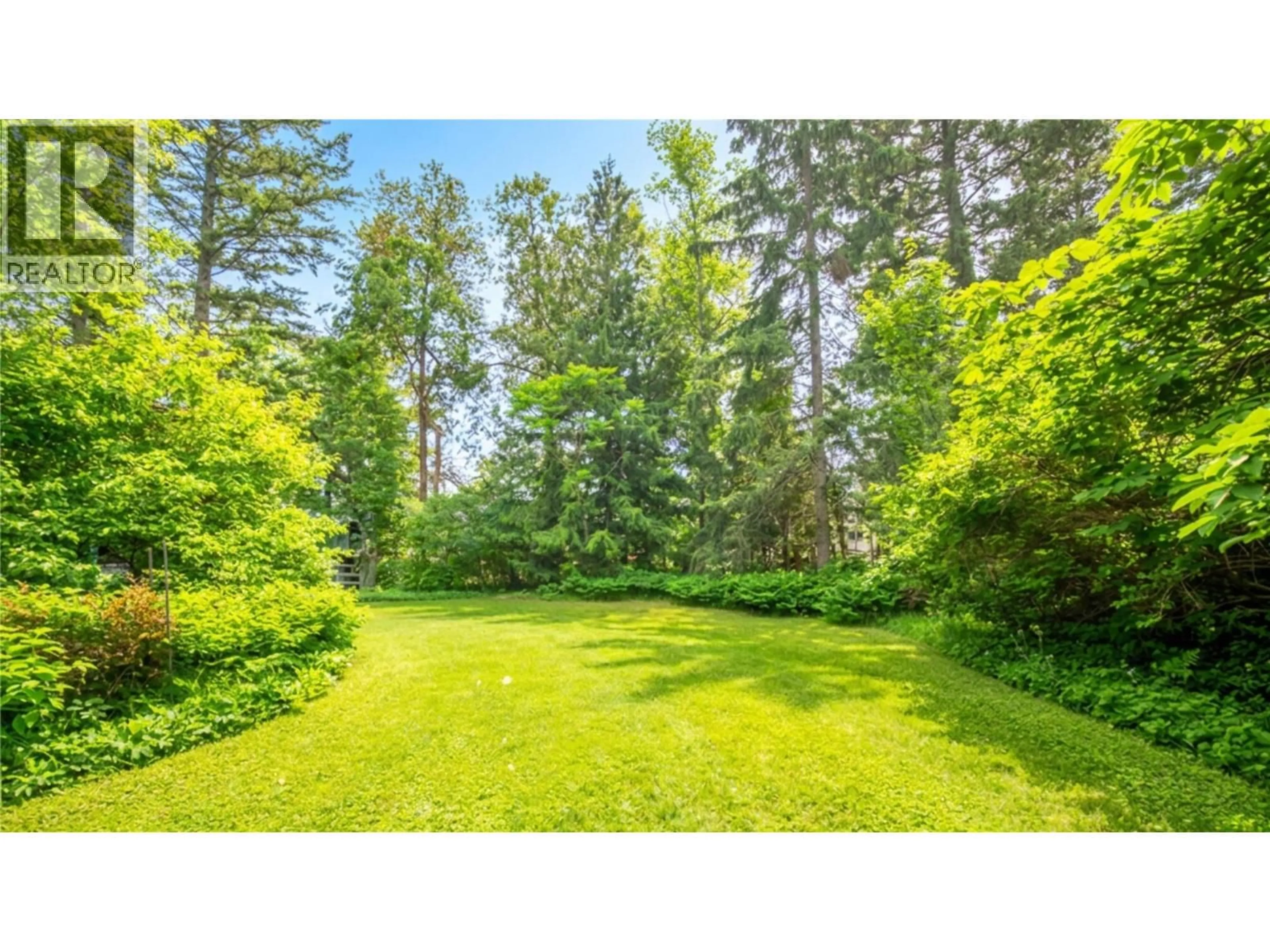 A pic from outside/outdoor area/front of a property/back of a property/a pic from drone, forest/trees view for 33 BIRCH ROAD, Lumby British Columbia V0E2G5