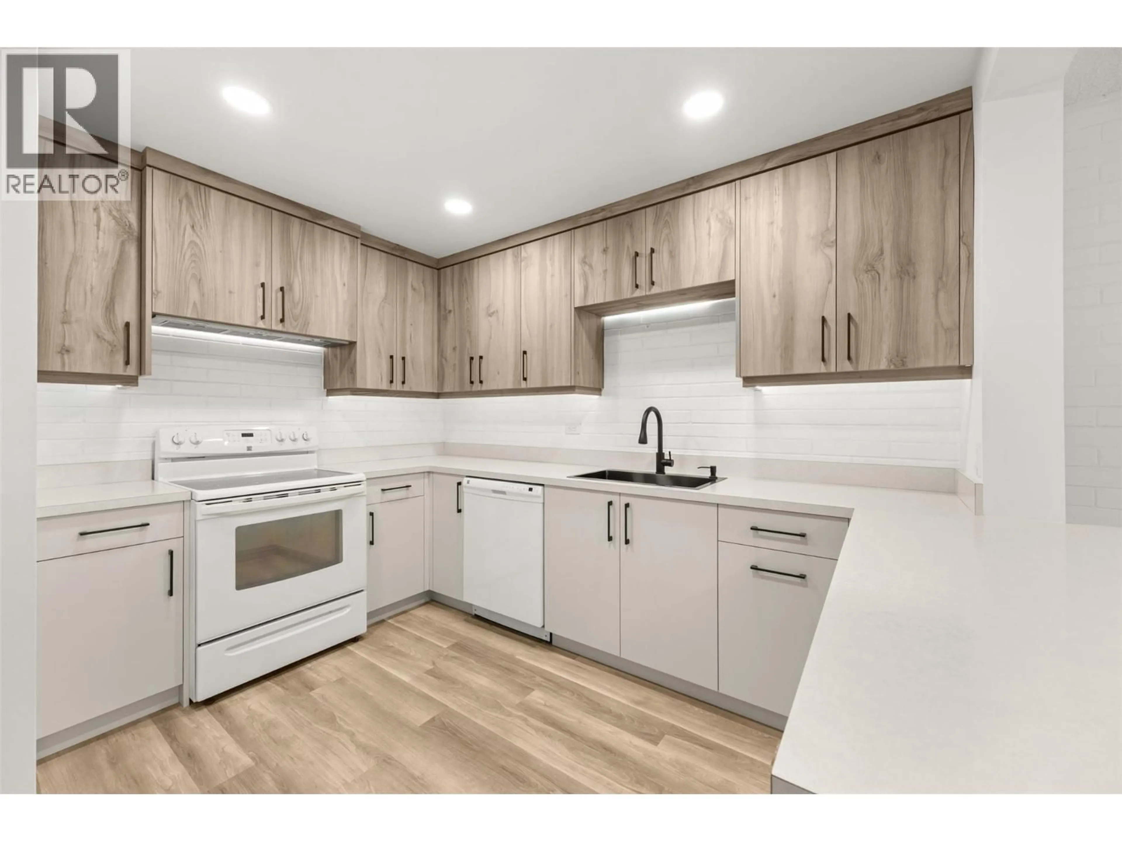 Standard kitchen, wood/laminate floor for 104 - 1915 PACIFIC COURT, Kelowna British Columbia V1Y8B3