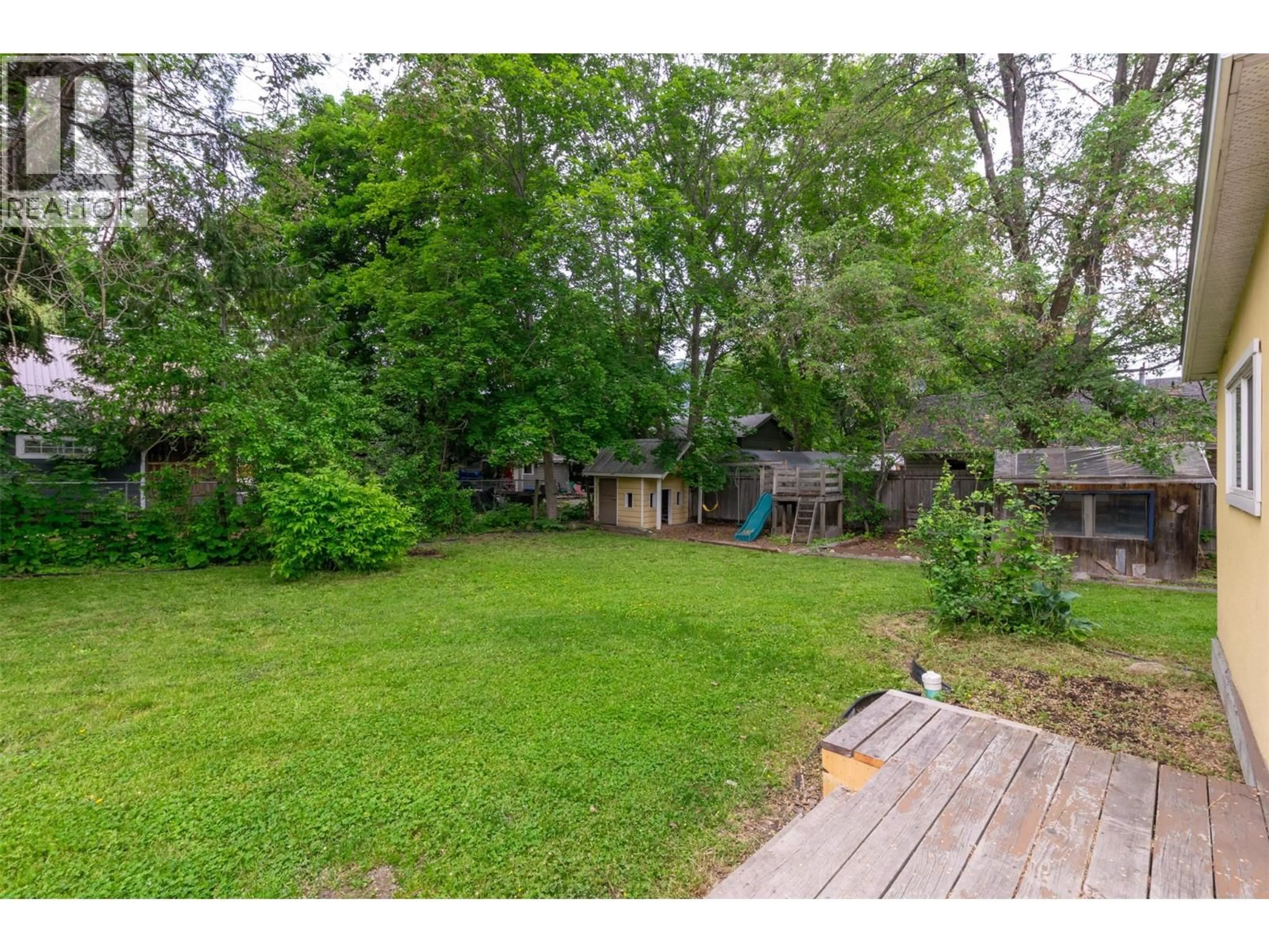 A pic from outside/outdoor area/front of a property/back of a property/a pic from drone, forest/trees view for 5081 70 AVENUE NORTHEAST, Salmon Arm British Columbia V0E1K0