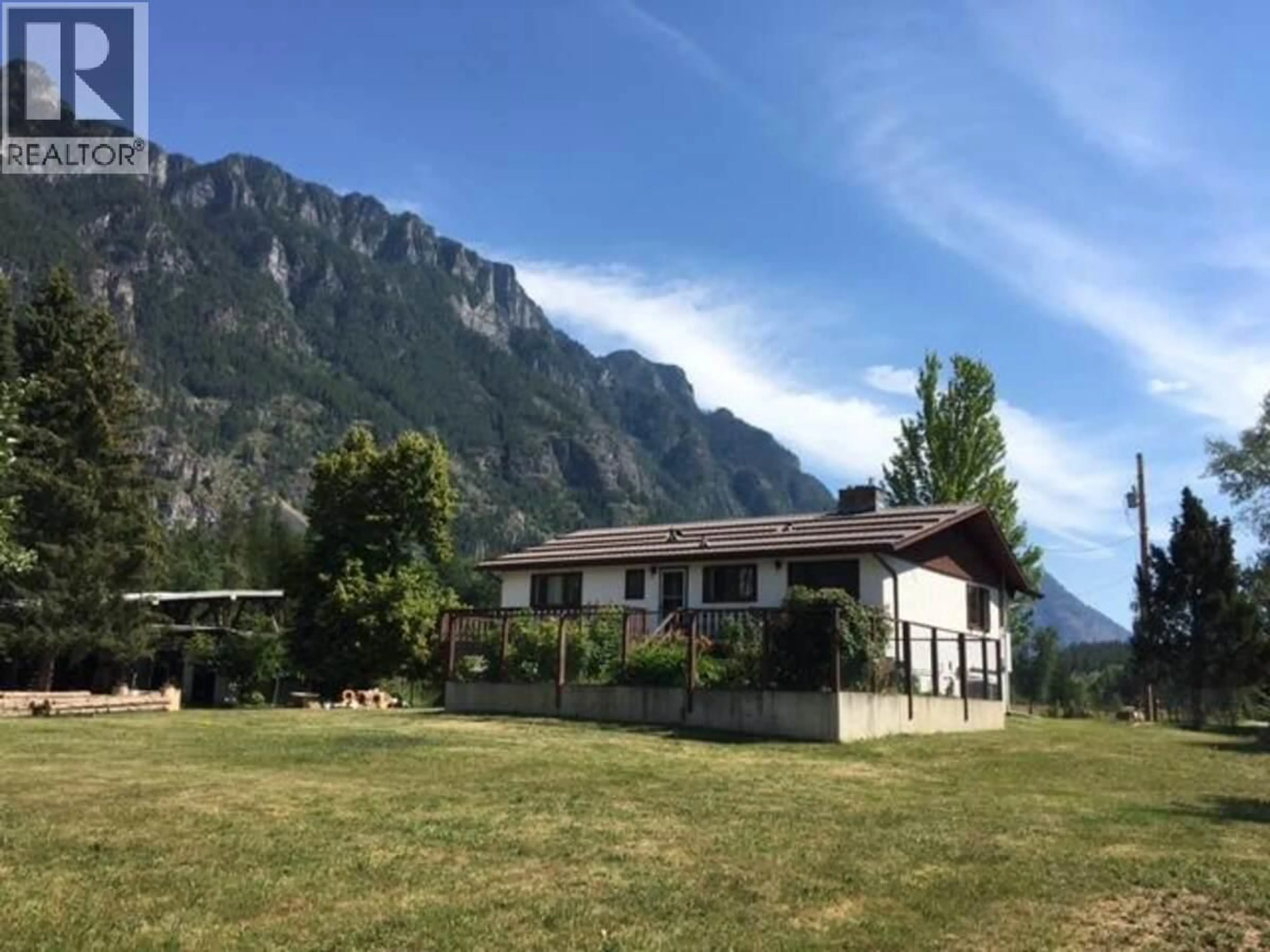 A pic from outside/outdoor area/front of a property/back of a property/a pic from drone, mountain view for 4856 32 STREET, Canyon British Columbia V0B1C1