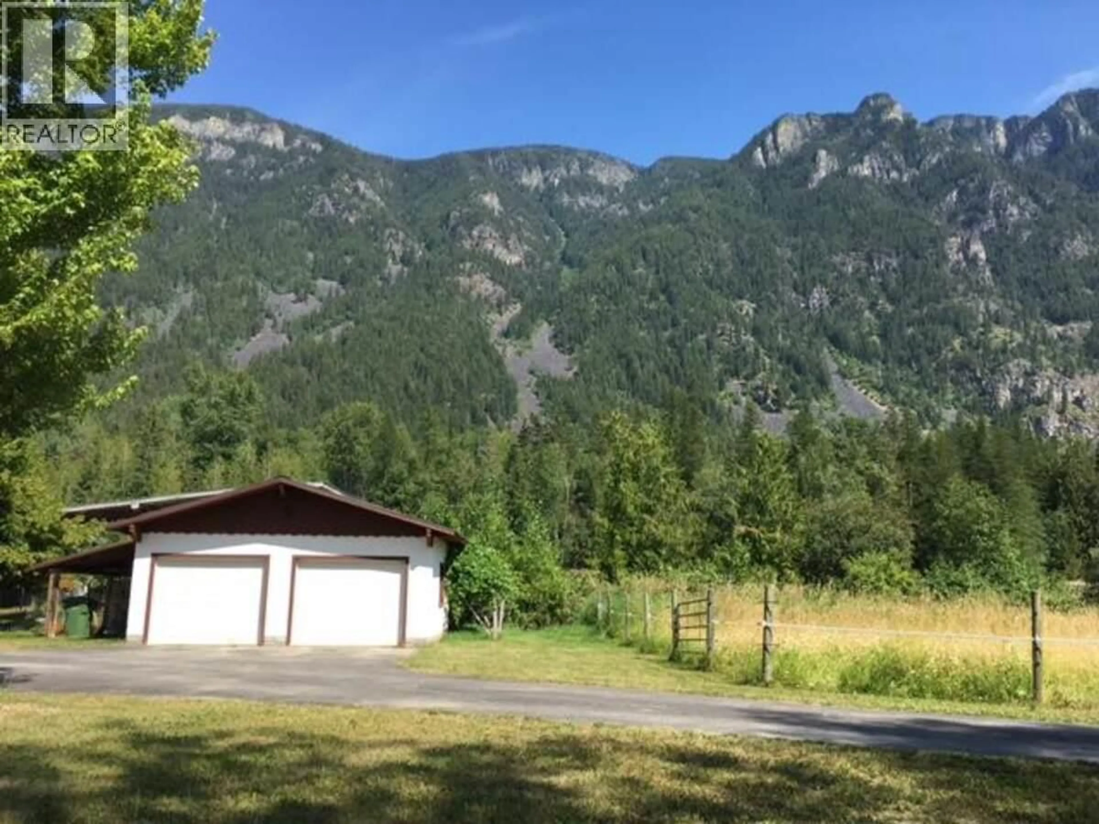 A pic from outside/outdoor area/front of a property/back of a property/a pic from drone, mountain view for 4856 32 STREET, Canyon British Columbia V0B1C1