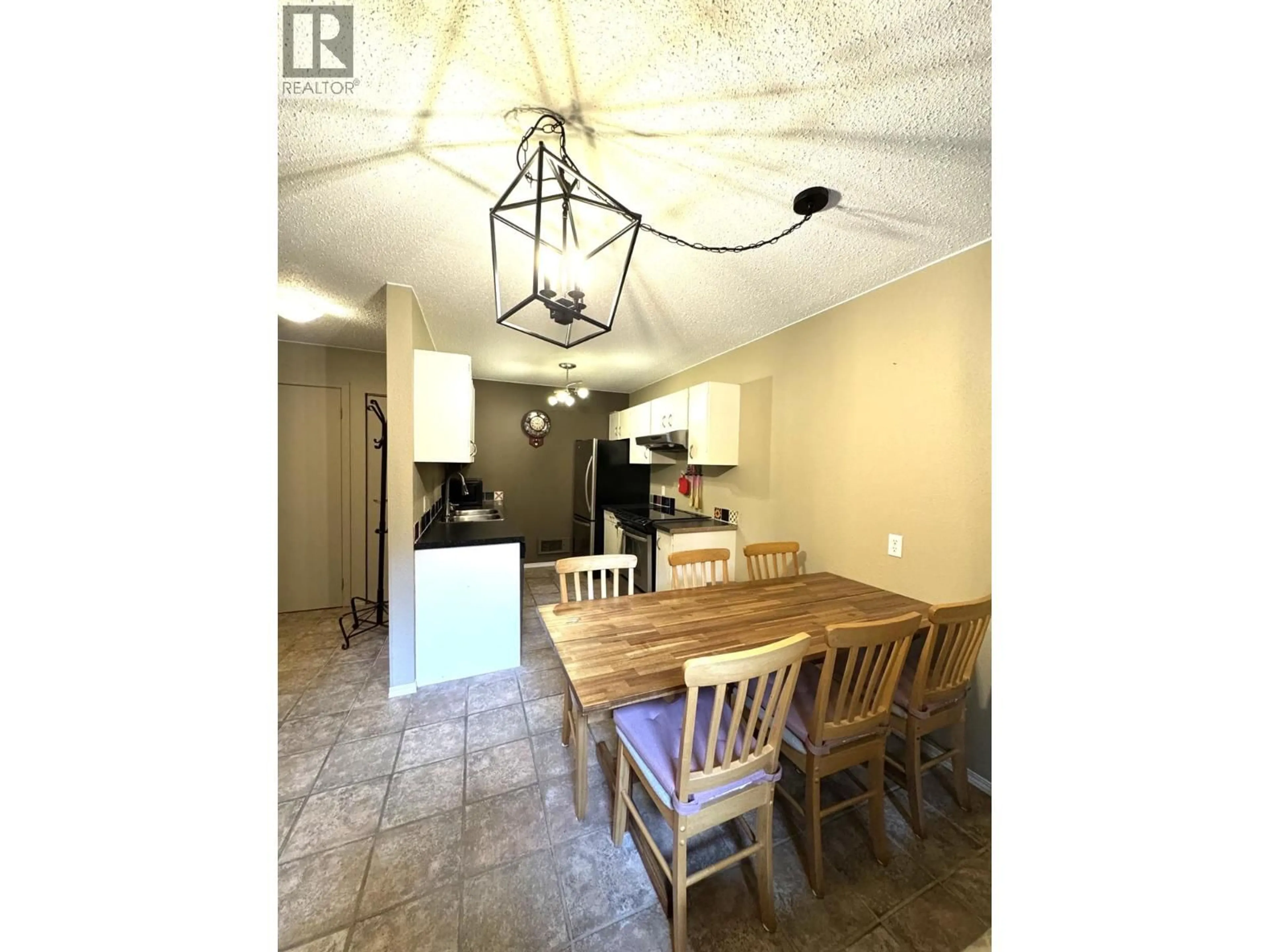 Open concept kitchen, ceramic/tile floor for 1024 - 930 DOGWOOD DRIVE, Kimberley British Columbia V1A1B9