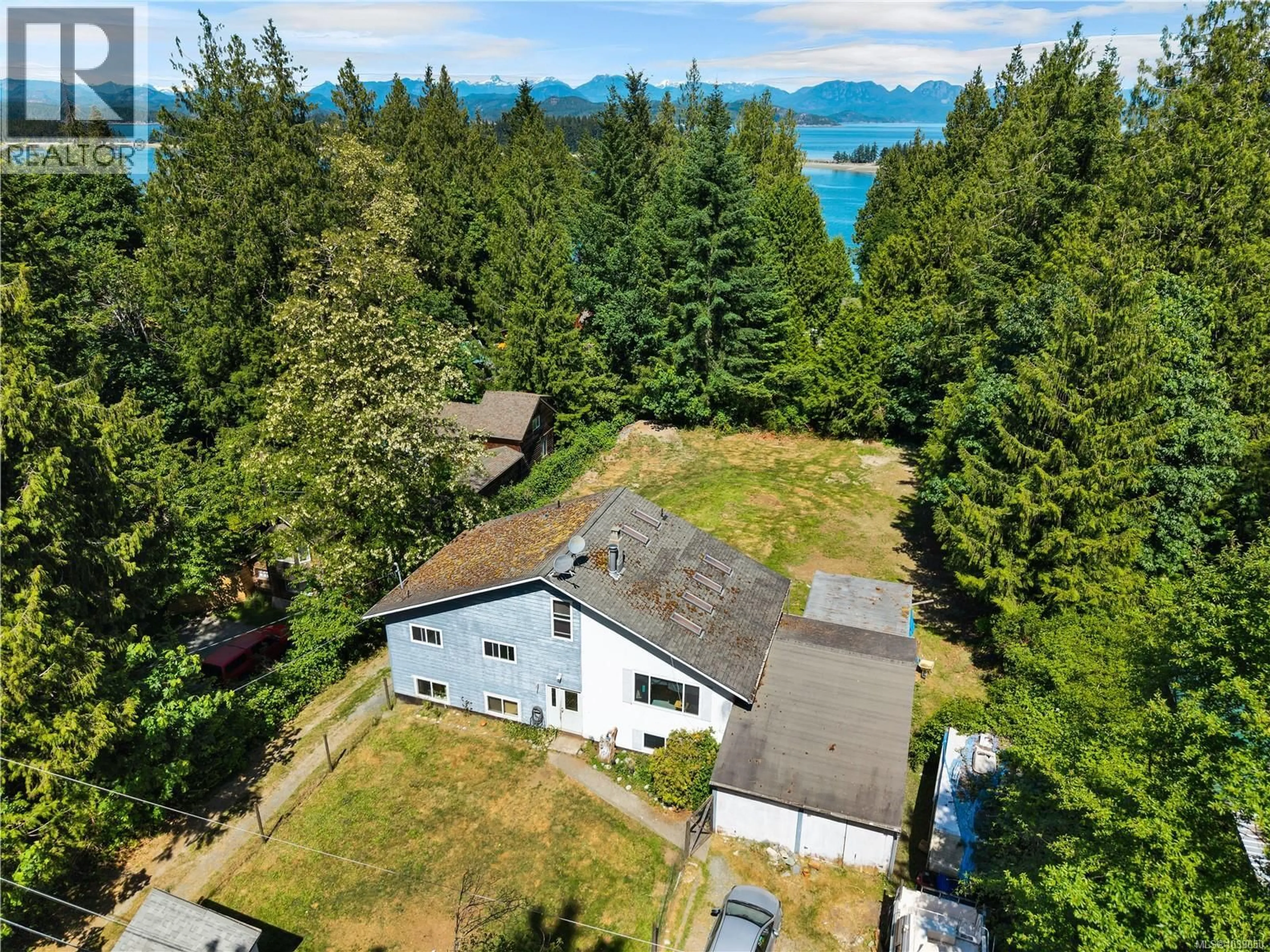 A pic from outside/outdoor area/front of a property/back of a property/a pic from drone, water/lake/river/ocean view for 1376 HOOLEY ROAD, Quadra Island British Columbia V0P1N0