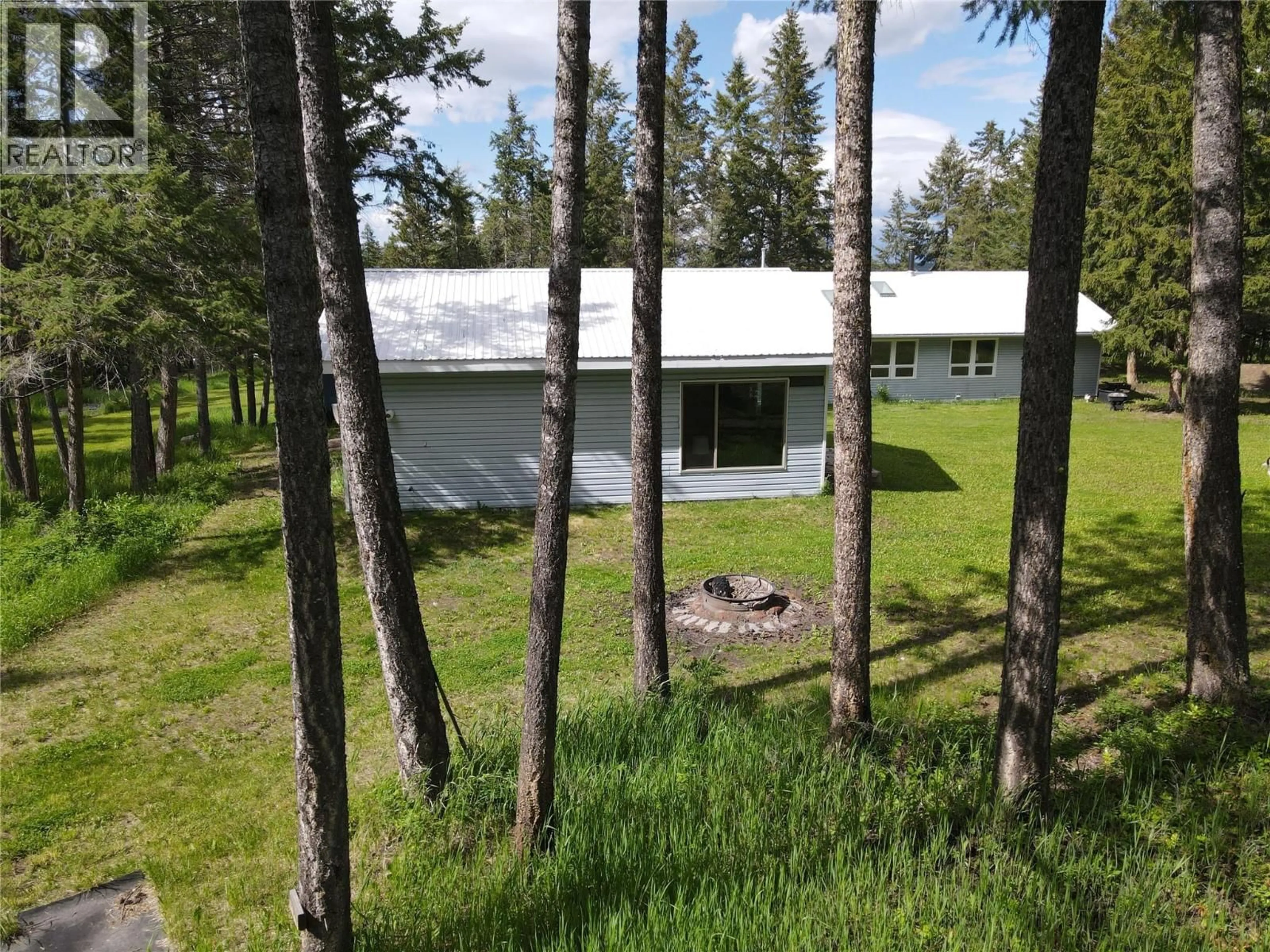 A pic from outside/outdoor area/front of a property/back of a property/a pic from drone, forest/trees view for 3601 49TH STREET SOUTH, Cranbrook British Columbia V1C7M1