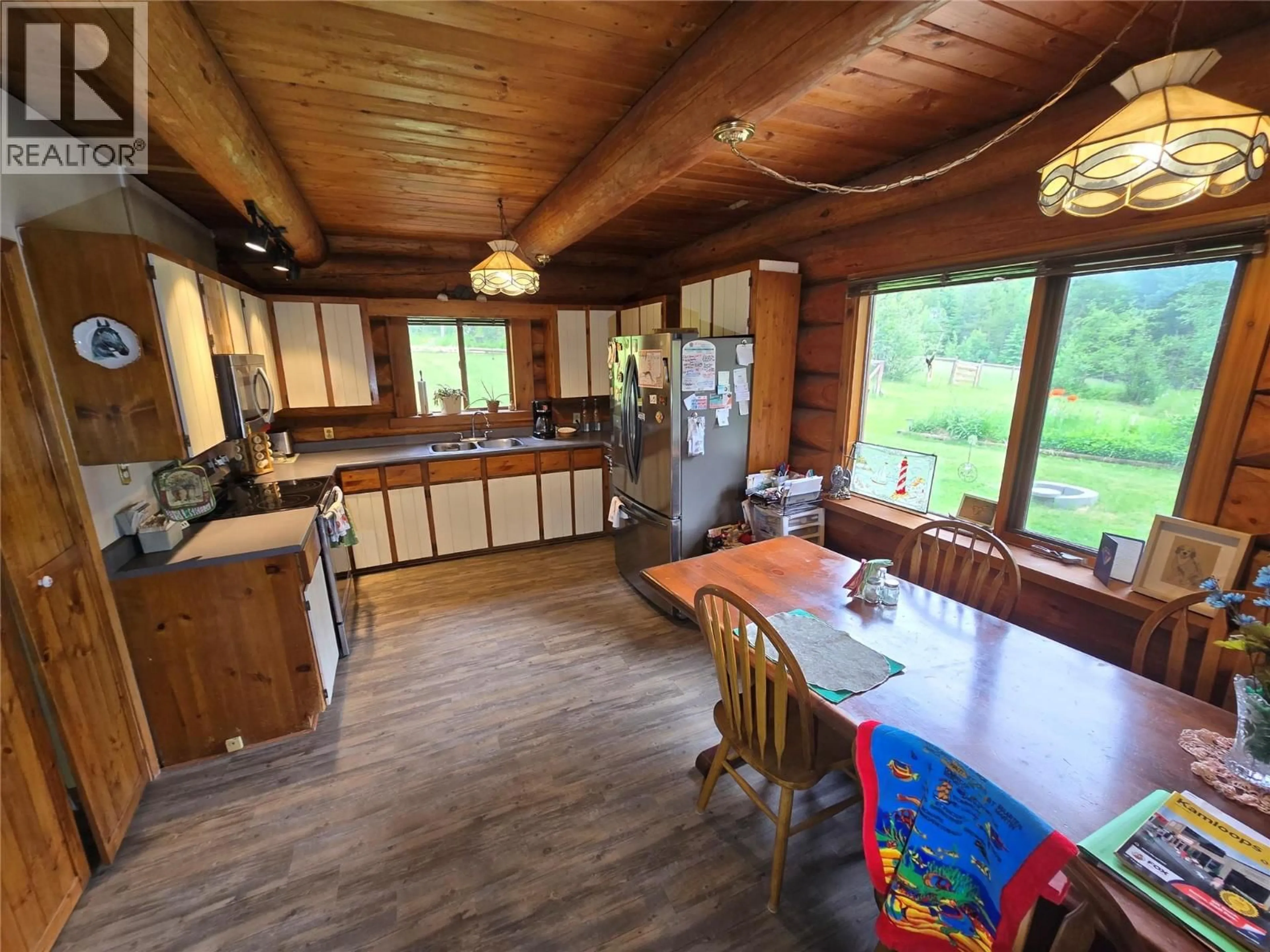 Open concept kitchen, wood/laminate floor for 2492 LLOYD ROAD, Clearwater British Columbia V0E3A0