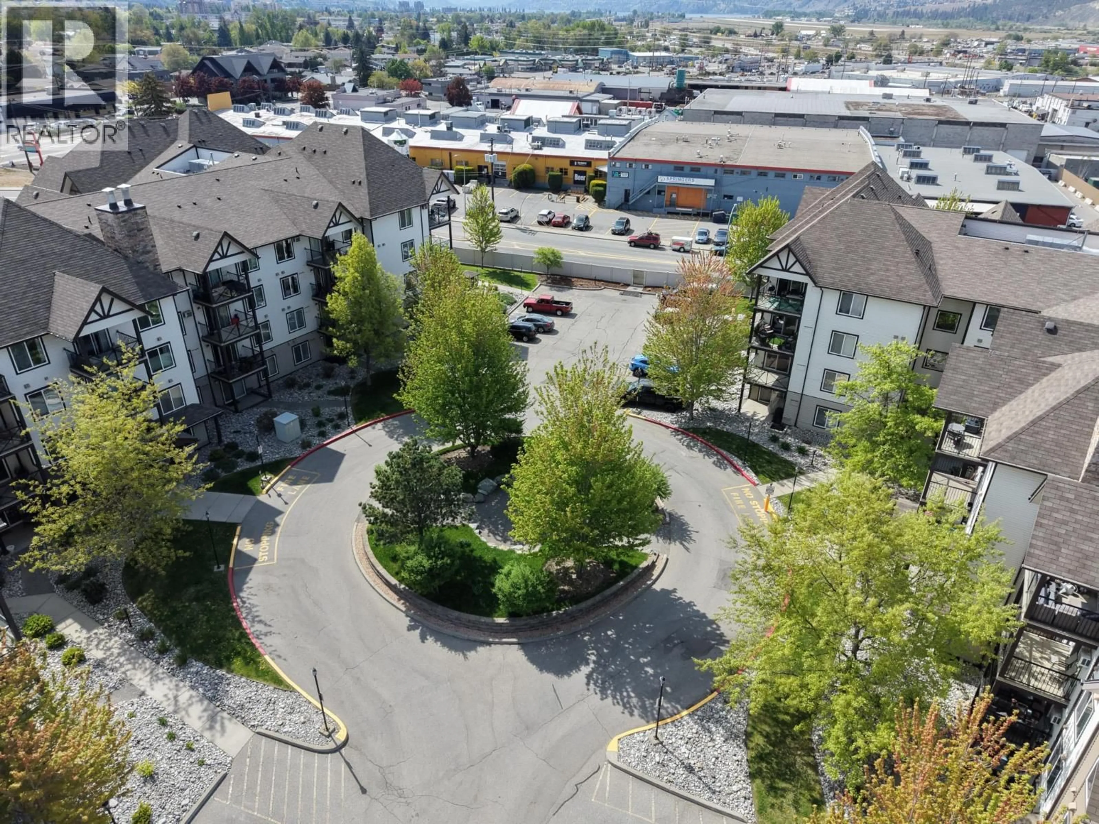 A pic from outside/outdoor area/front of a property/back of a property/a pic from drone, unknown for 404 - 256 HASTINGS AVENUE, Penticton British Columbia V2A2V6