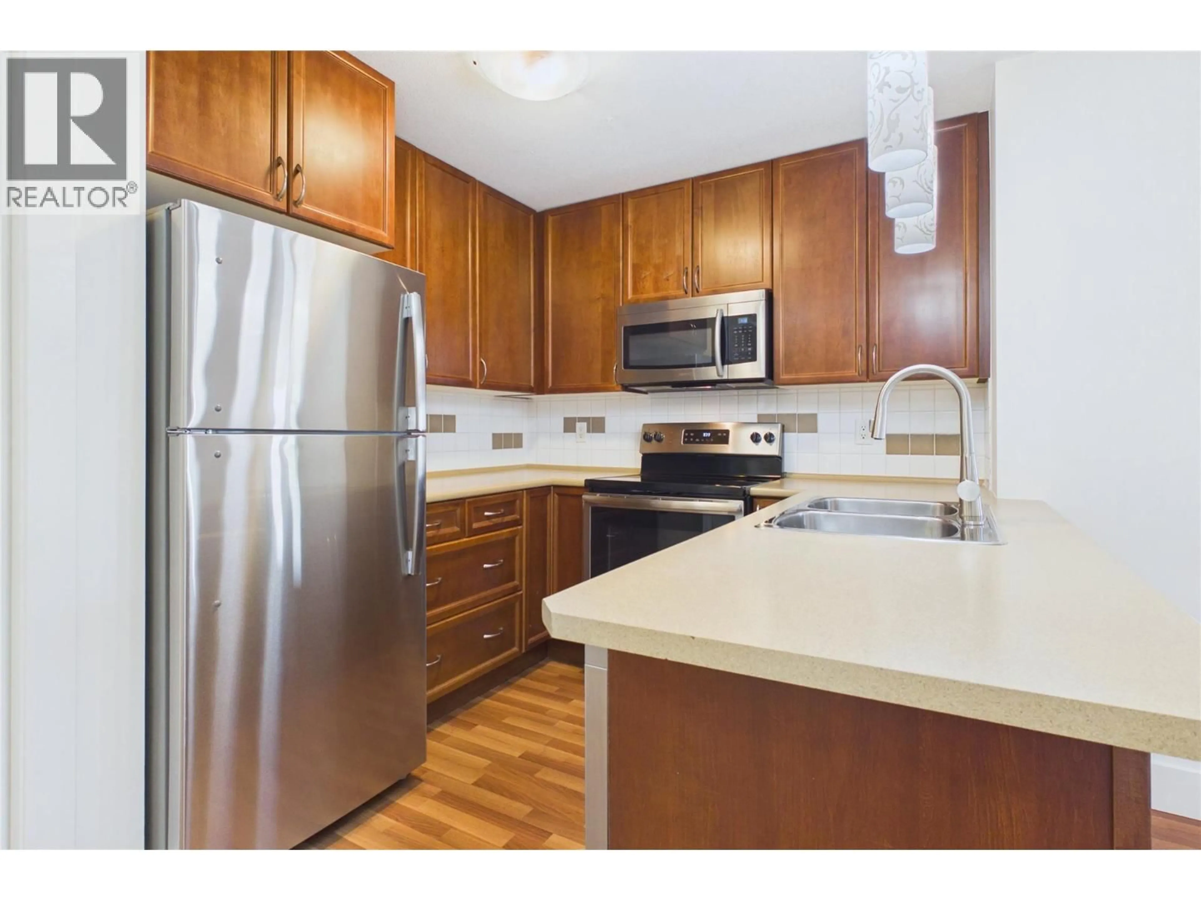 Standard kitchen, wood/laminate floor for 404 - 256 HASTINGS AVENUE, Penticton British Columbia V2A2V6