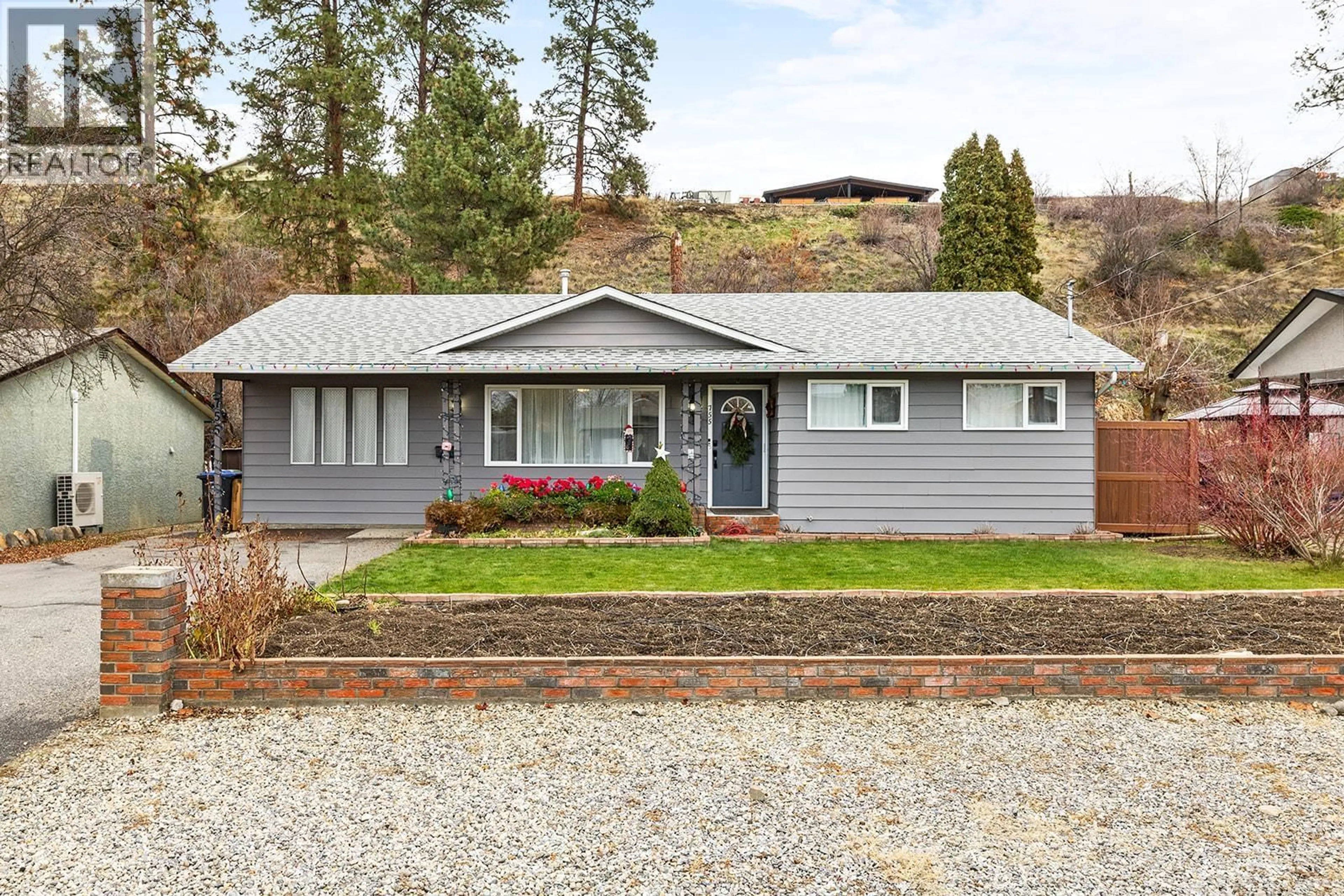 Home with vinyl exterior material, street for 755 CAMELIA ROAD, Kelowna British Columbia V1X3M9