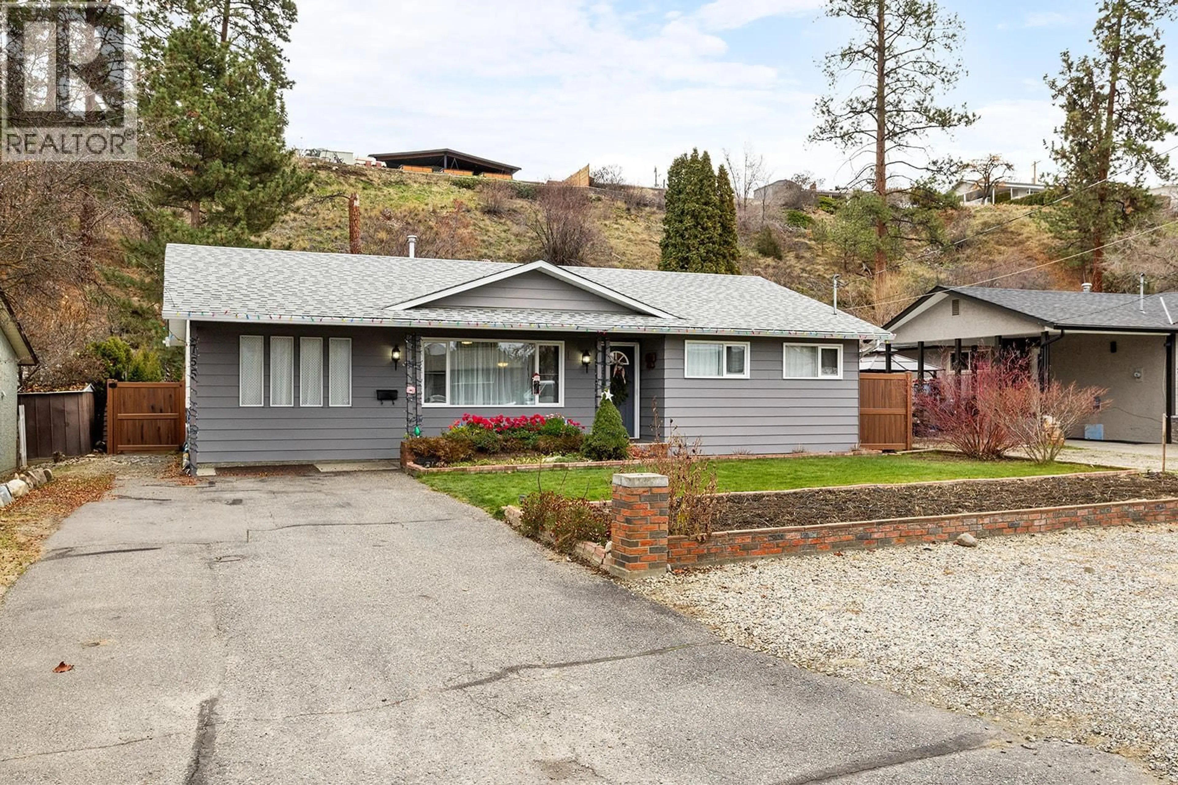 Home with vinyl exterior material, street for 755 CAMELIA ROAD, Kelowna British Columbia V1X3M9