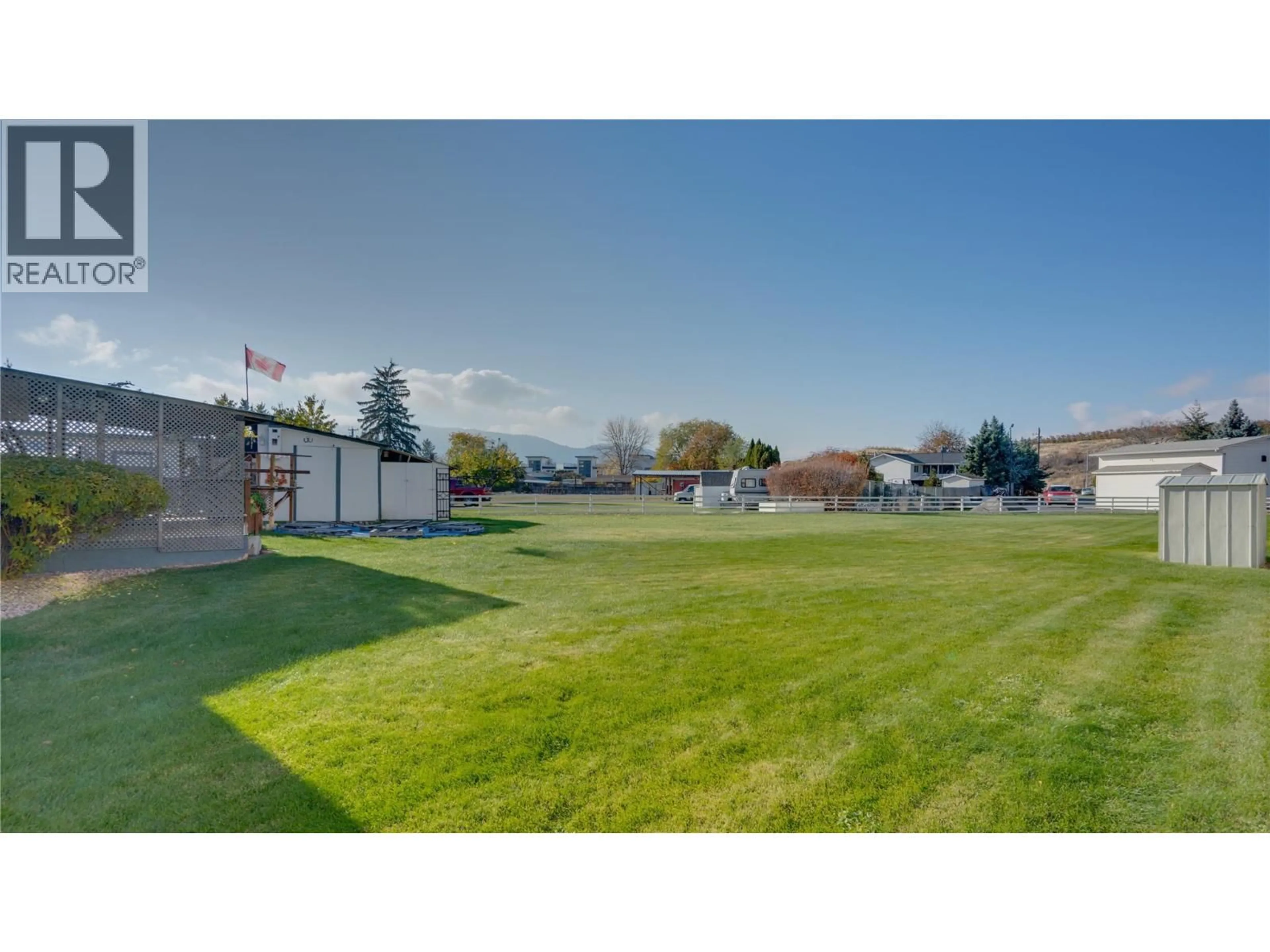 A pic from outside/outdoor area/front of a property/back of a property/a pic from drone, mountain view for 5595 27 AVENUE, Vernon British Columbia V1T7A3
