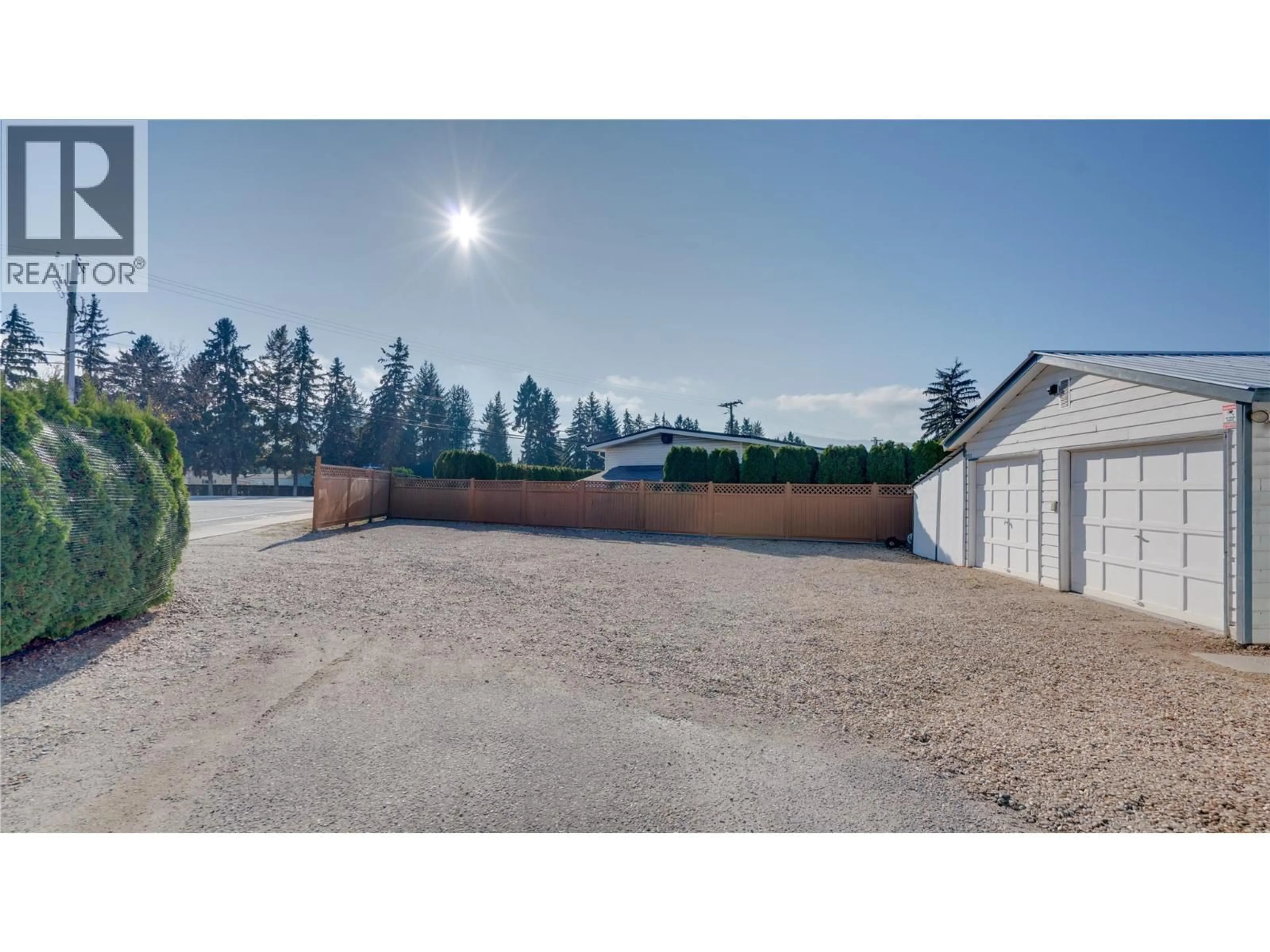 A pic from outside/outdoor area/front of a property/back of a property/a pic from drone, street for 5595 27 AVENUE, Vernon British Columbia V1T7A3