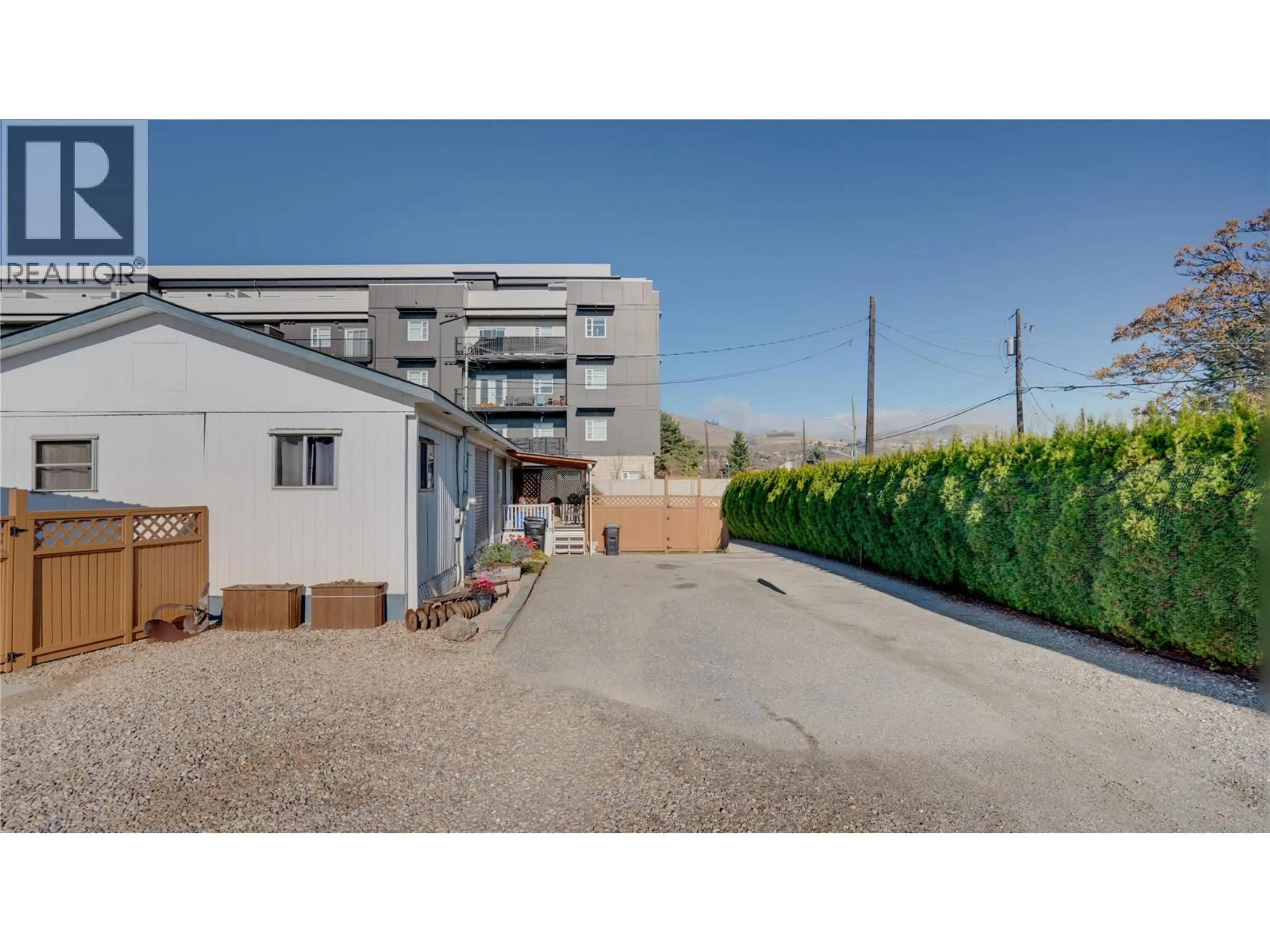 A pic from outside/outdoor area/front of a property/back of a property/a pic from drone, street for 5595 27 AVENUE, Vernon British Columbia V1T7A3
