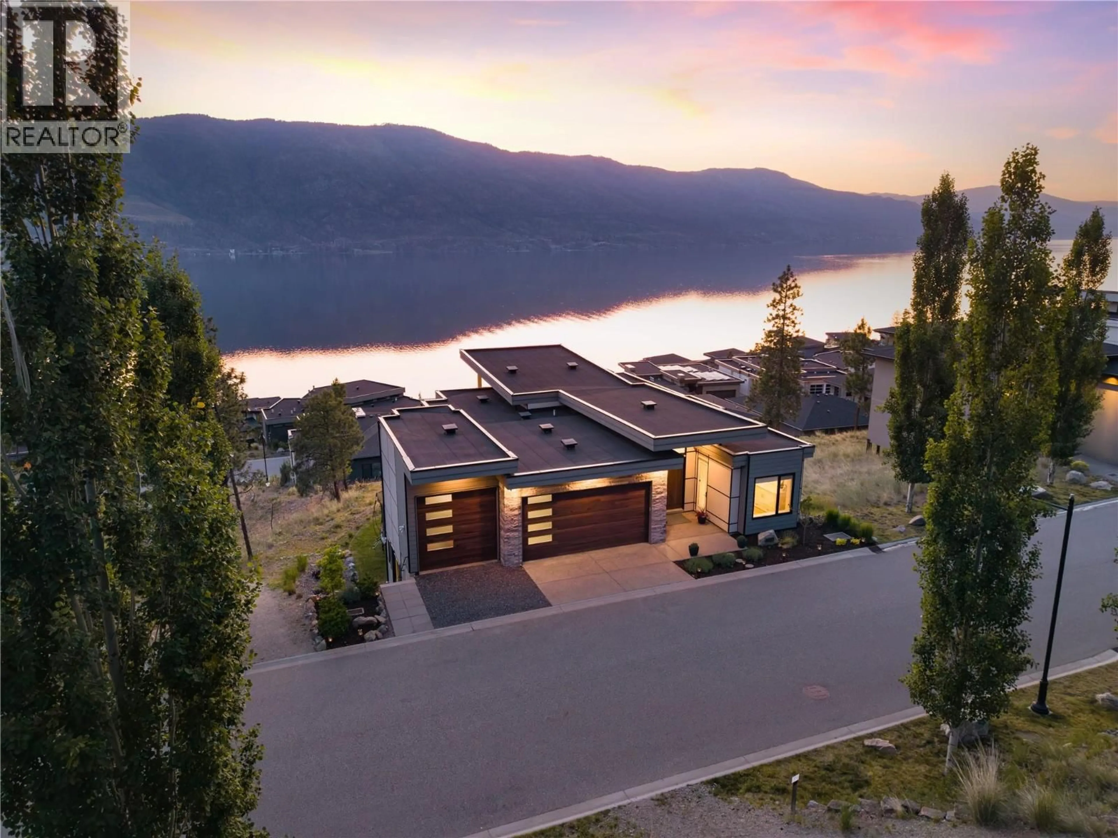 A pic from outside/outdoor area/front of a property/back of a property/a pic from drone, mountain view for 3323 WATER BIRCH CIRCLE, Kelowna British Columbia V1V3G1