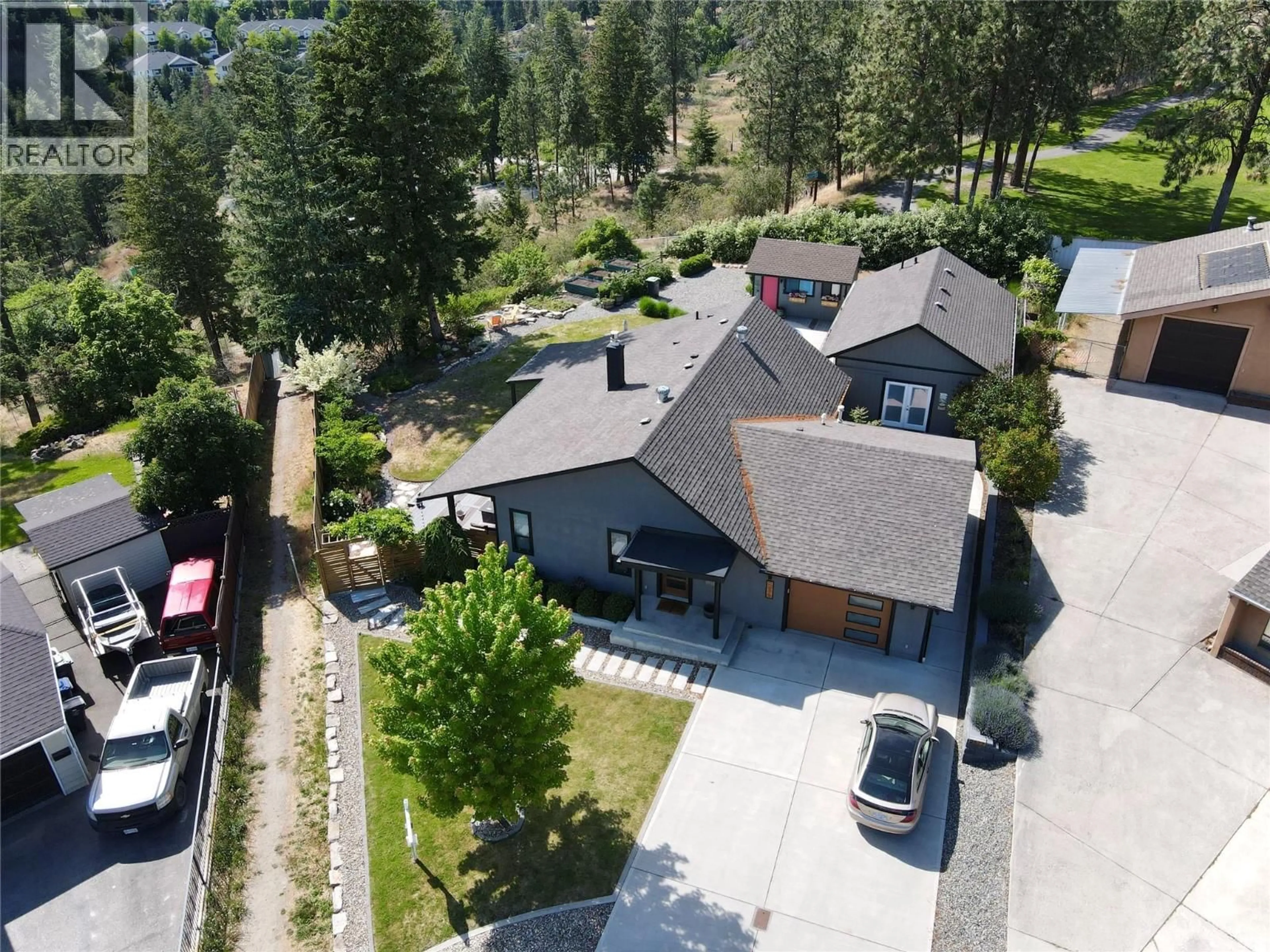 A pic from outside/outdoor area/front of a property/back of a property/a pic from drone, mountain view for 2575 PINERIDGE PLACE, West Kelowna British Columbia V4T2J7