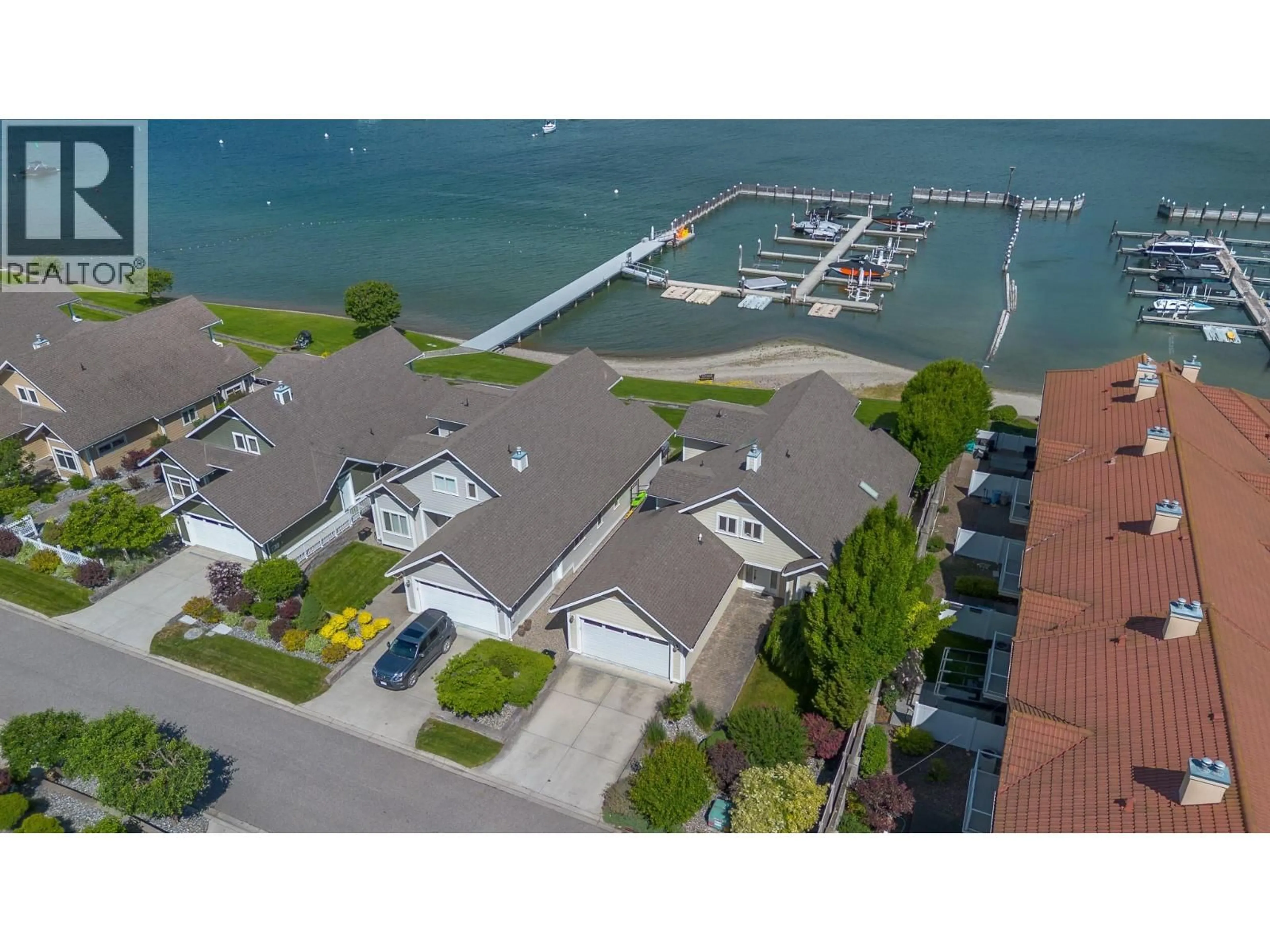 A pic from outside/outdoor area/front of a property/back of a property/a pic from drone, water/lake/river/ocean view for 7 - 7769 OKANAGAN LANDING ROAD, Vernon British Columbia V1H1V9