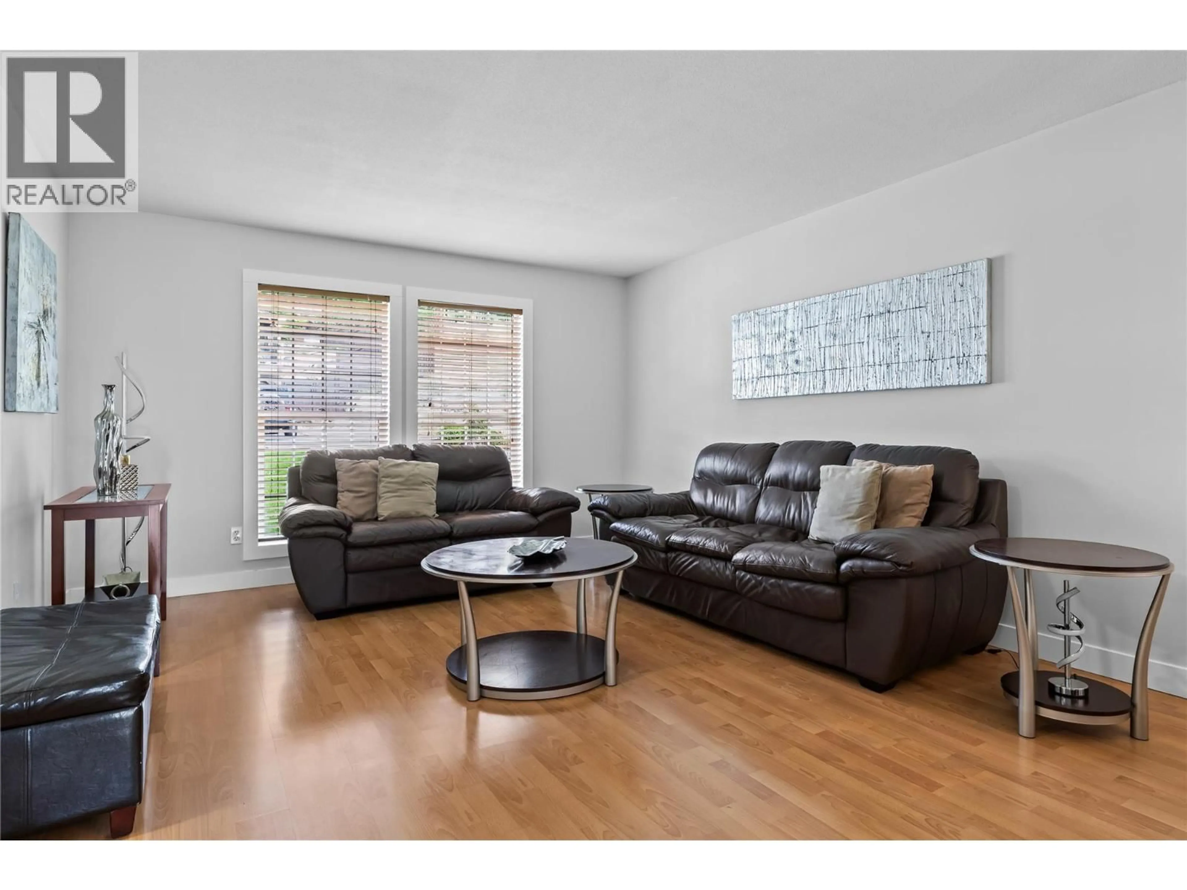 Living room with furniture, wood/laminate floor for 1132 - 2440 OLD OKANAGAN HIGHWAY, Westbank British Columbia V4T1X6