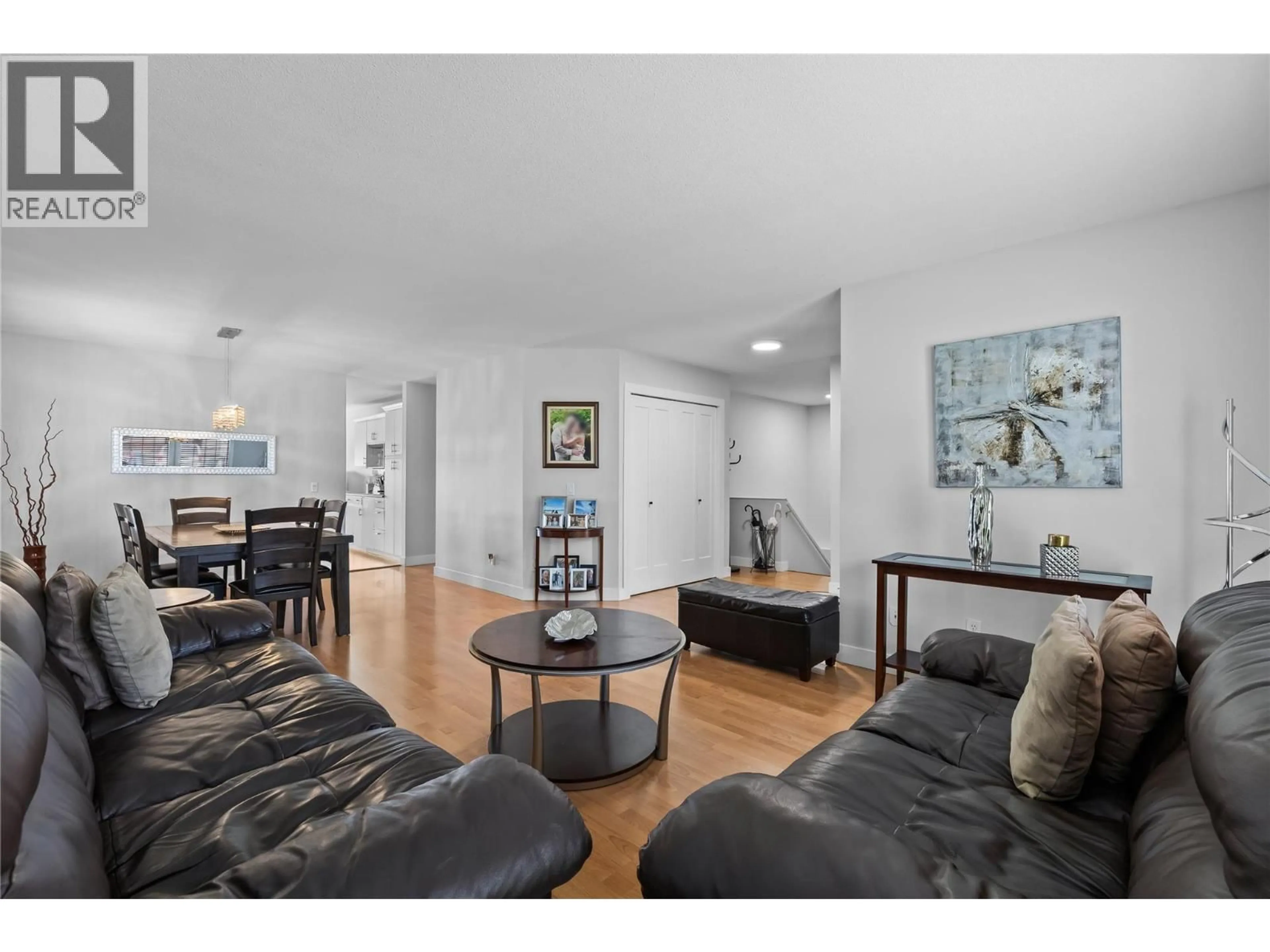 Living room with furniture, wood/laminate floor for 1132 - 2440 OLD OKANAGAN HIGHWAY, Westbank British Columbia V4T1X6