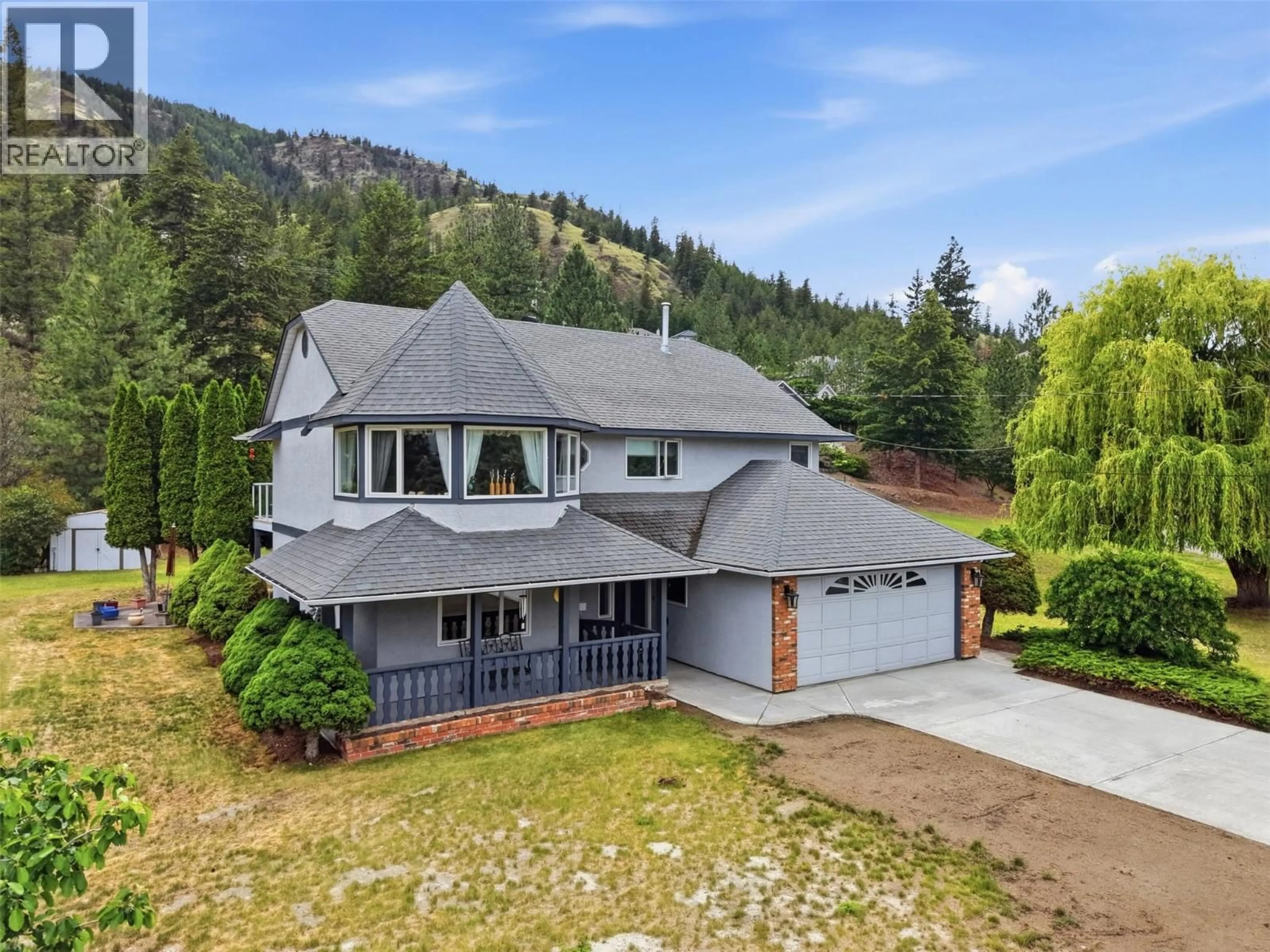 A pic from outside/outdoor area/front of a property/back of a property/a pic from drone, mountain view for 809 UPLANDS COURT, Kamloops British Columbia V2C6M8