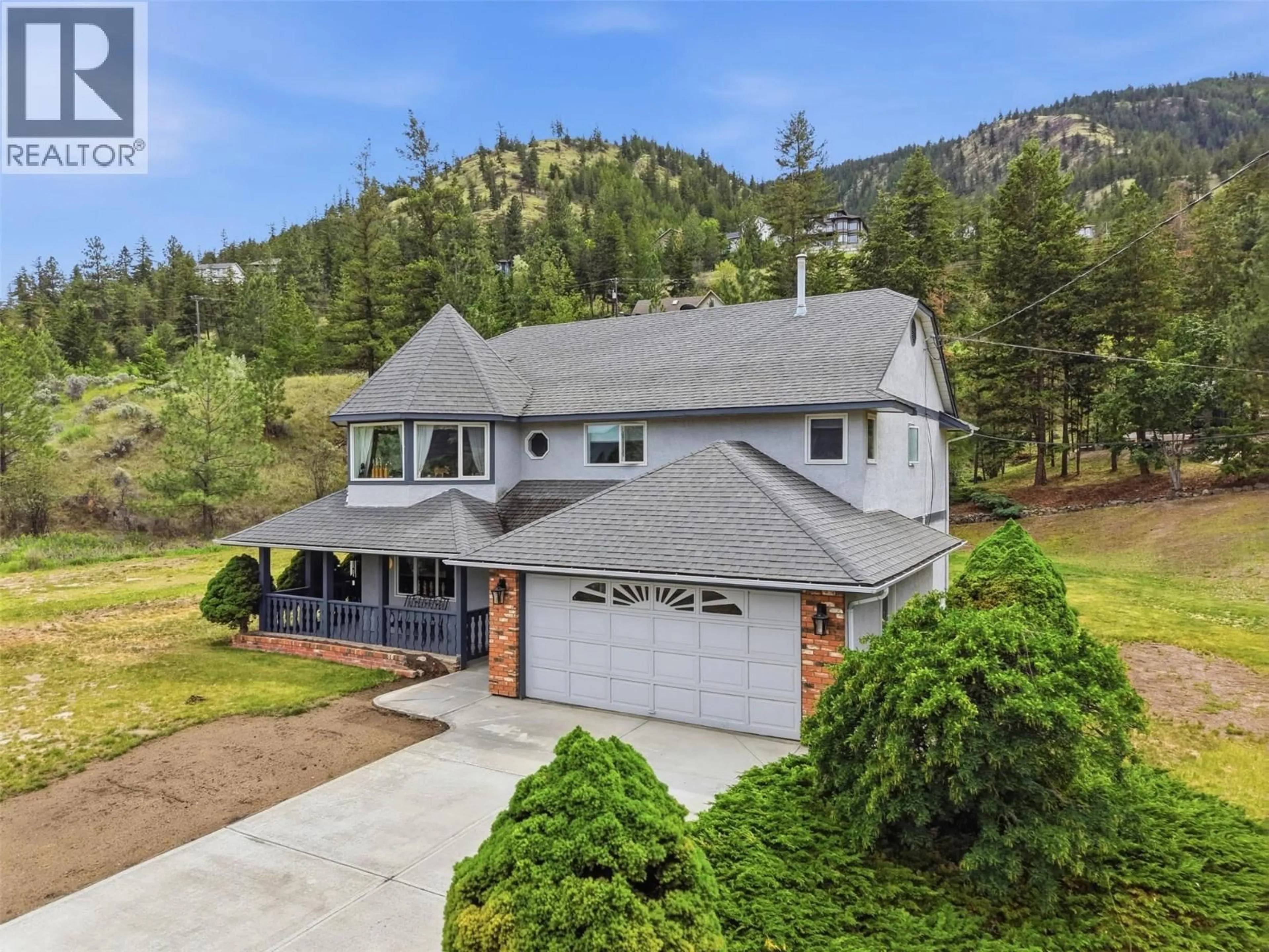A pic from outside/outdoor area/front of a property/back of a property/a pic from drone, mountain view for 809 UPLANDS COURT, Kamloops British Columbia V2C6M8