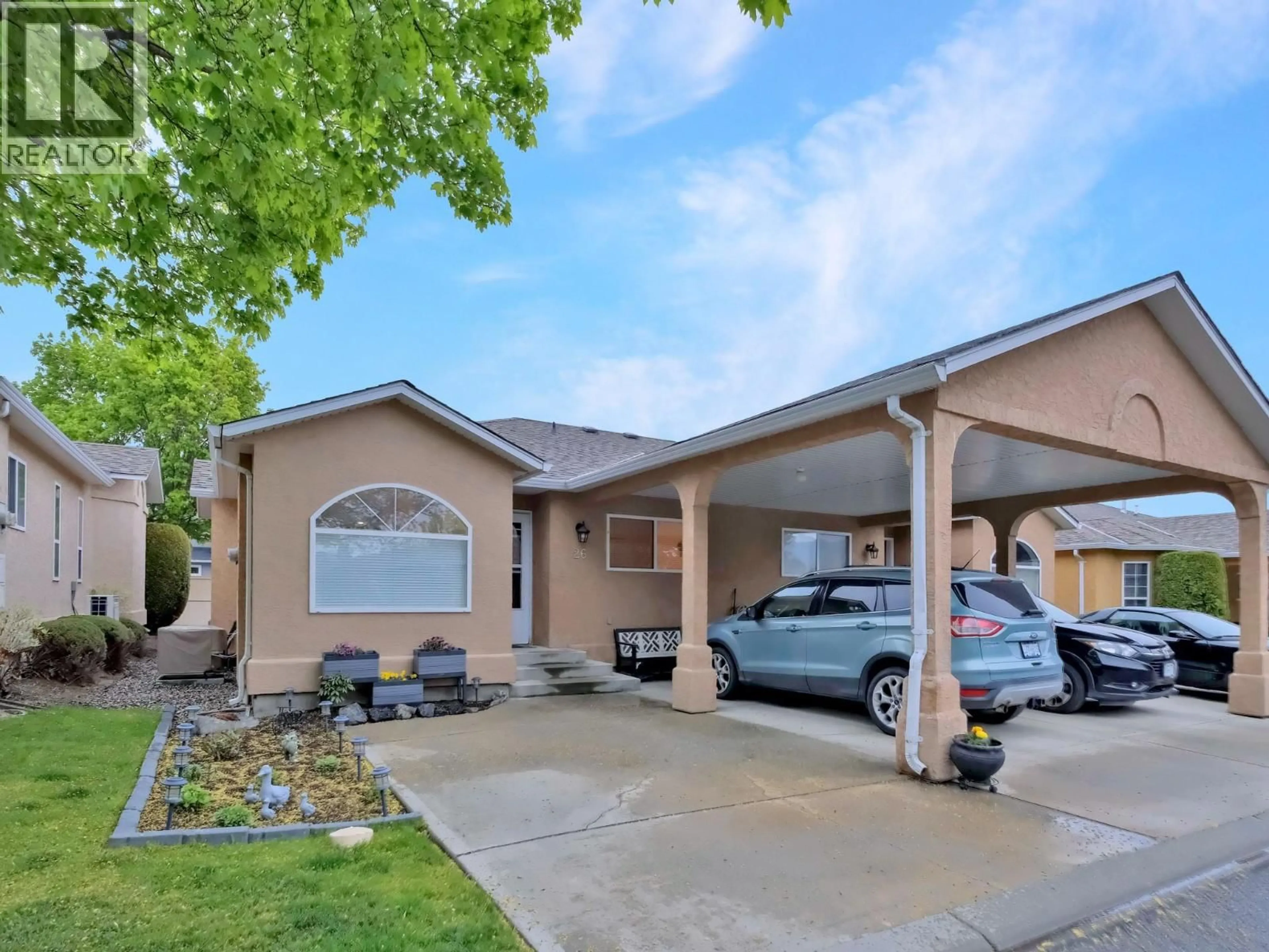 Home with vinyl exterior material, street for 26 - 2210 LOUIE DRIVE, West Kelowna British Columbia V4T2L3