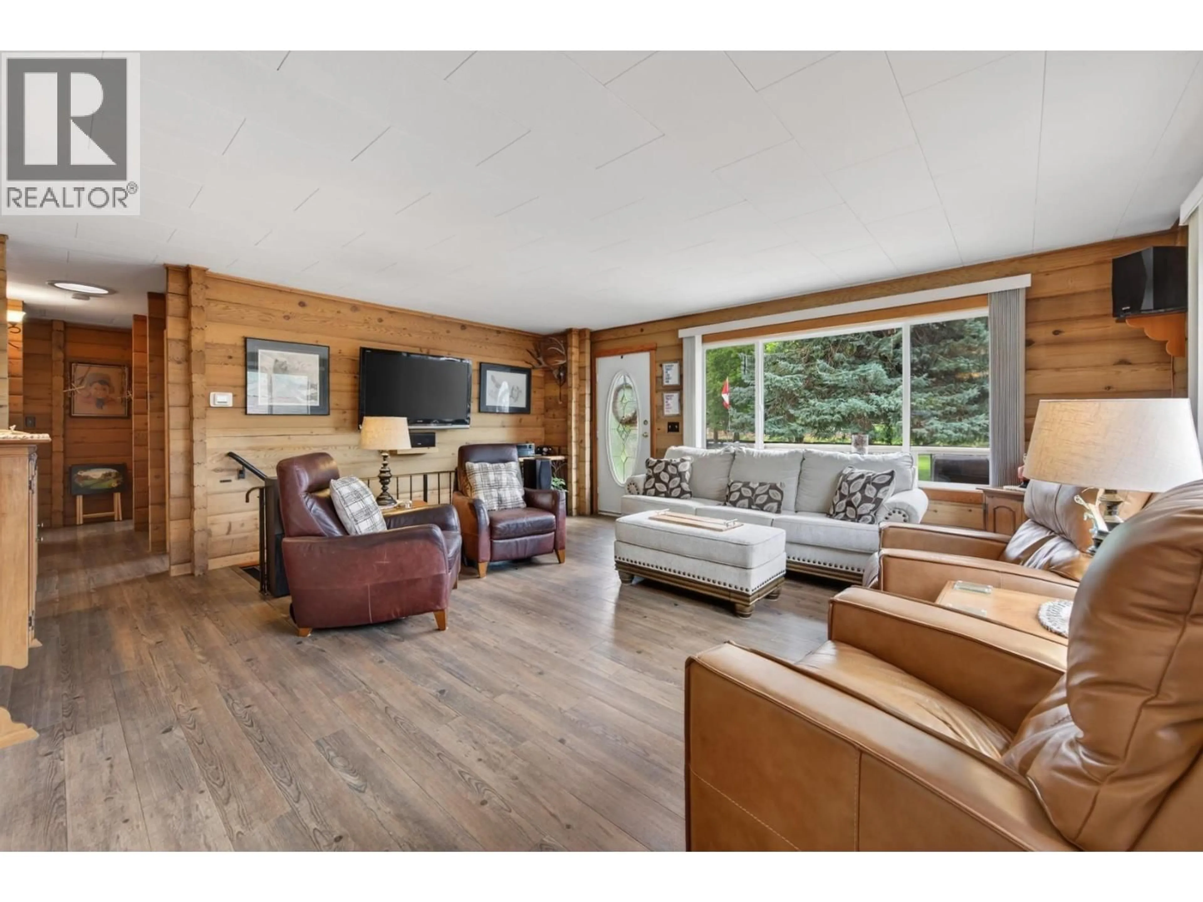 Living room with furniture, wood/laminate floor for 1477 MAIN STREET, Lillooet British Columbia V0K1V0