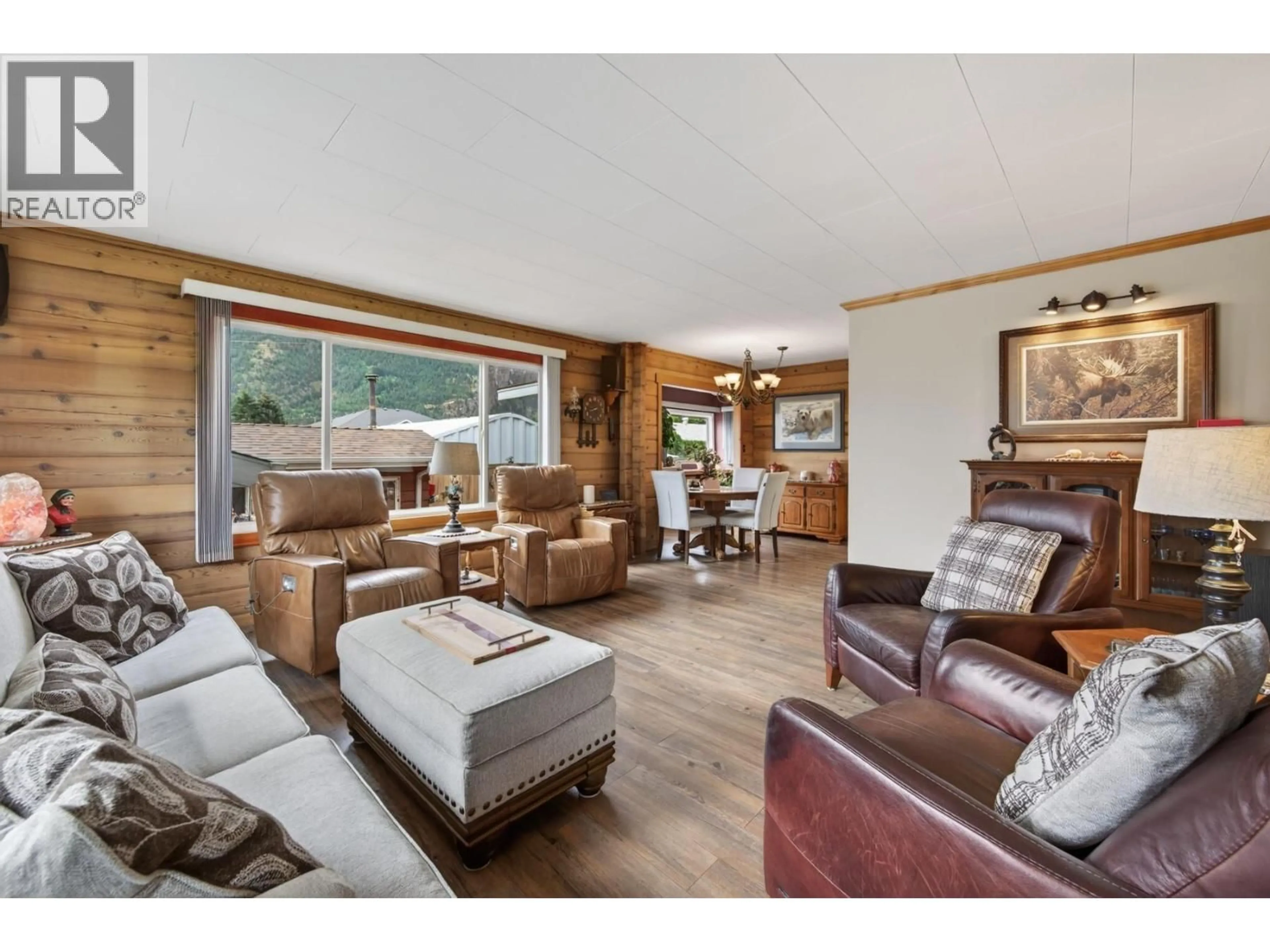 Living room with furniture, wood/laminate floor for 1477 MAIN STREET, Lillooet British Columbia V0K1V0