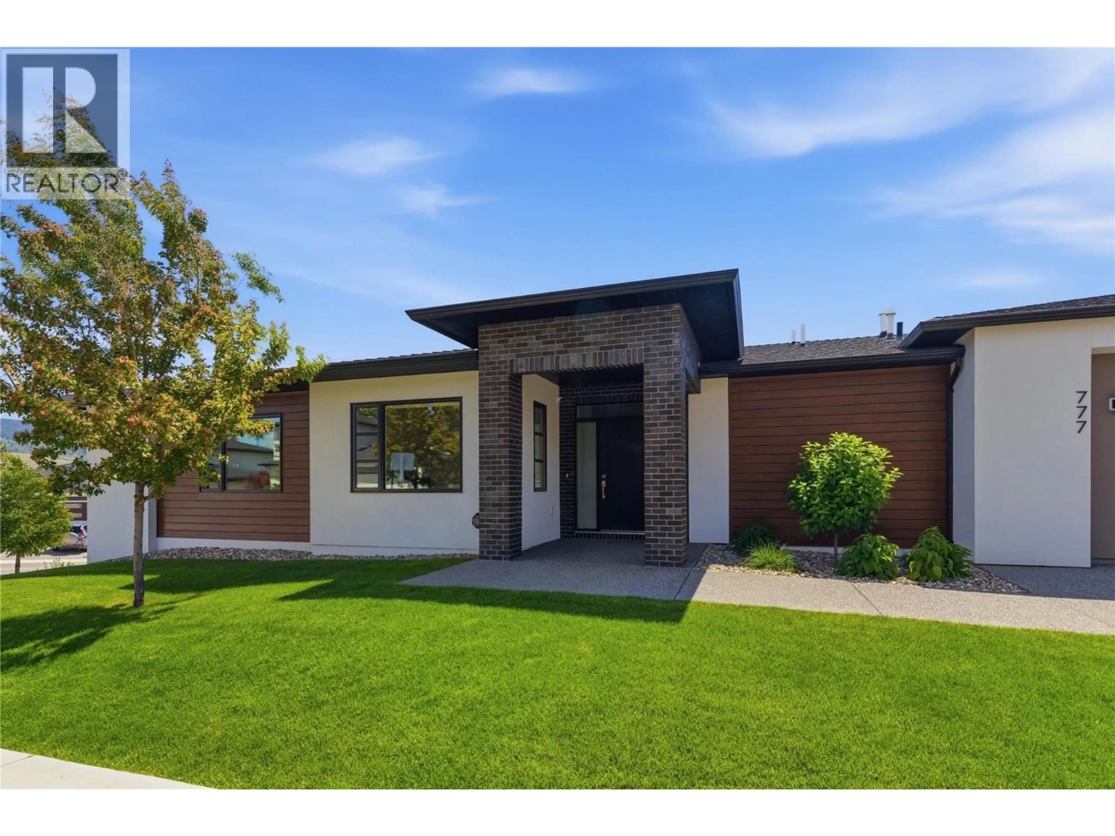 Home with brick exterior material, street for 777 ACADIA STREET, Kelowna British Columbia V1V0A8