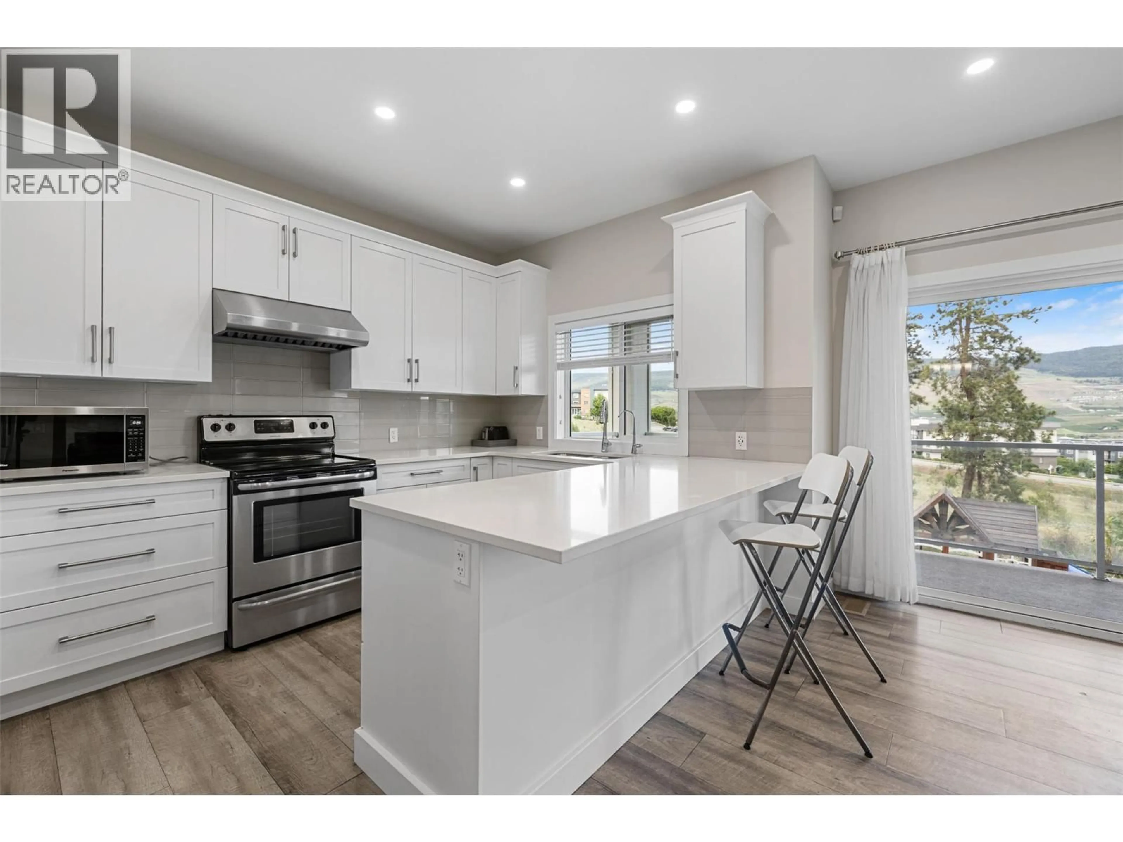 Open concept kitchen, unknown for 695 CONCORDIA STREET, Kelowna British Columbia V1V0A9