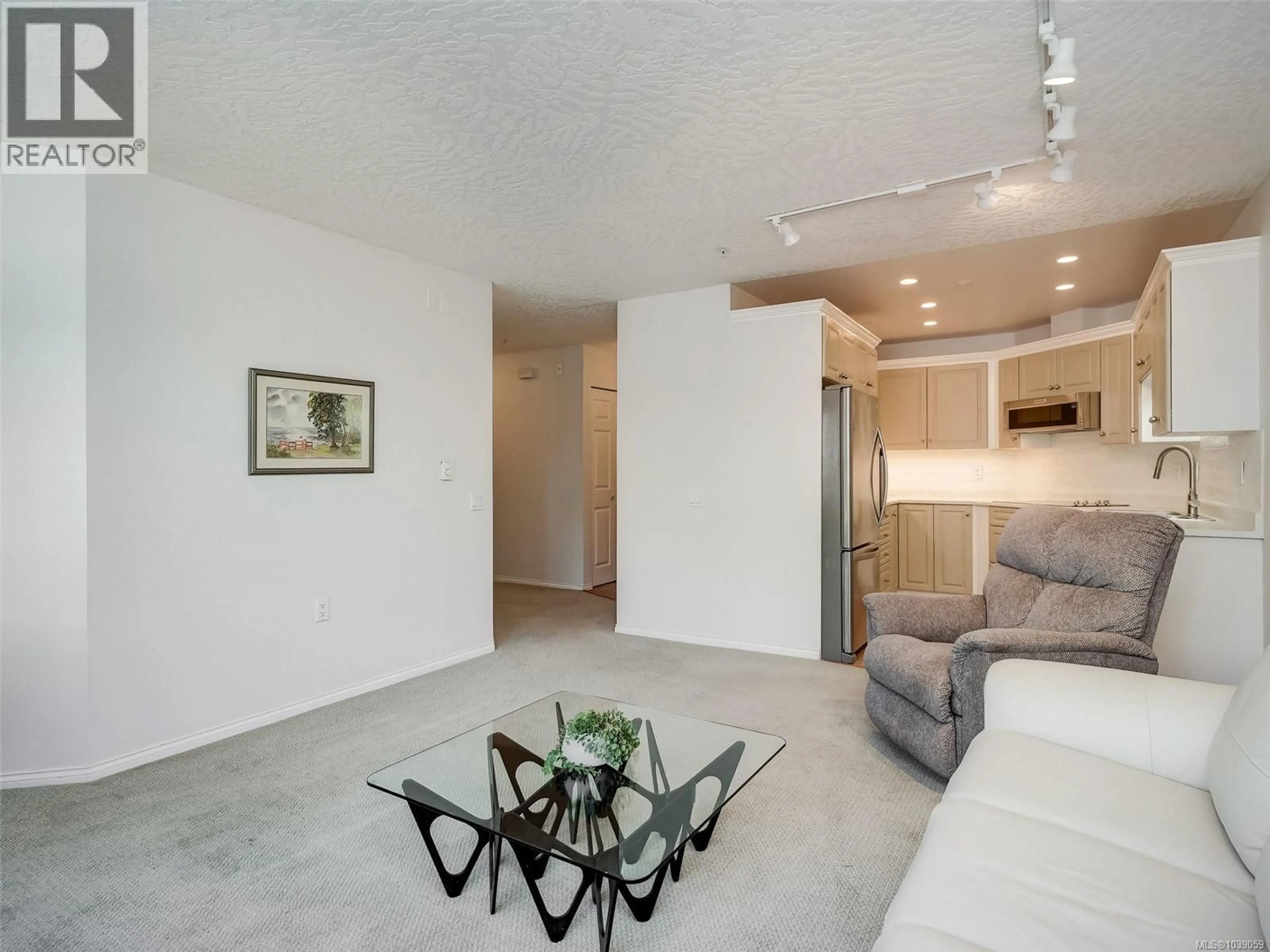 Living room with furniture, unknown for 312 - 1521 CHURCH AVENUE, Saanich British Columbia V8P5T7