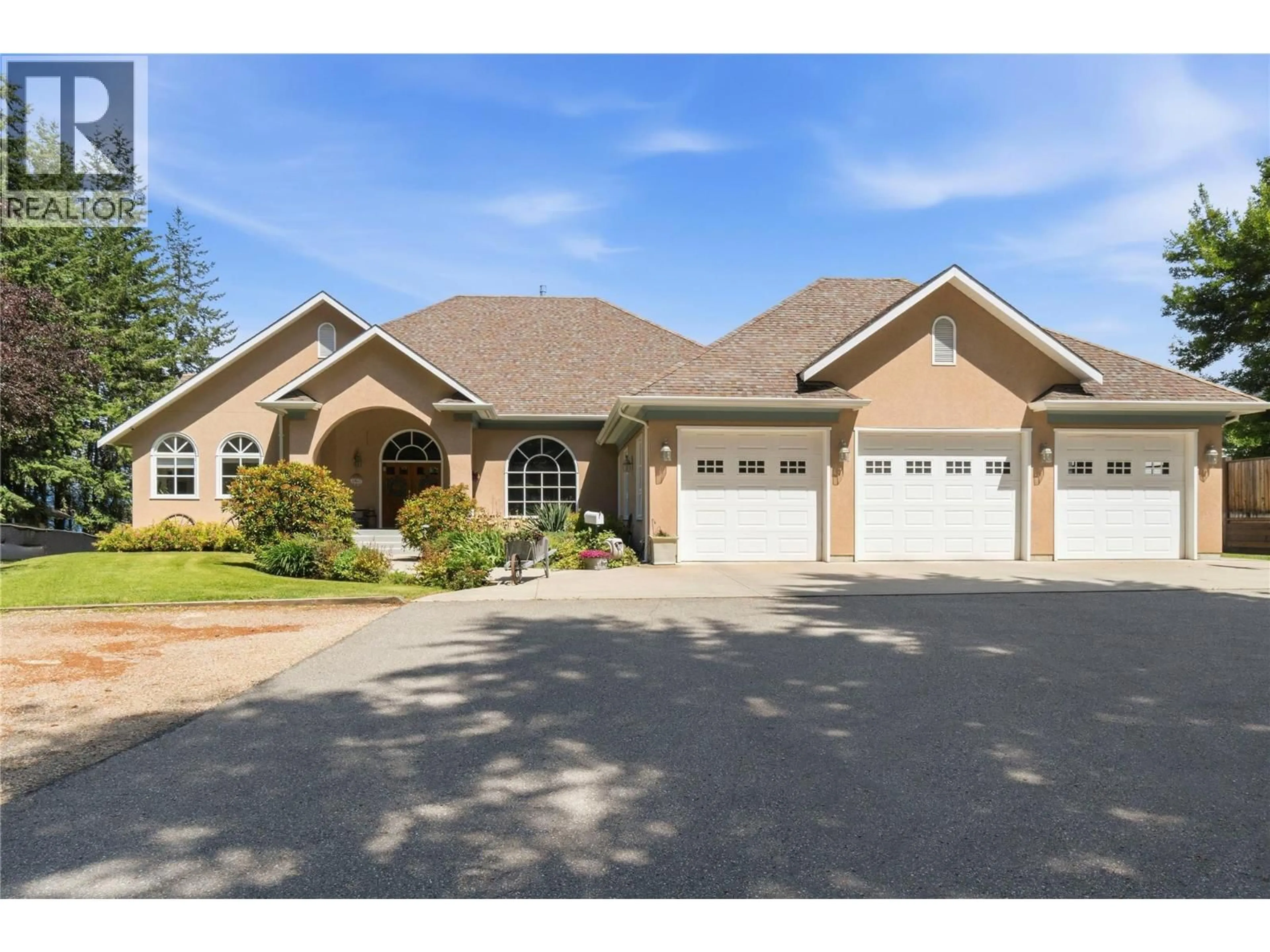 Home with brick exterior material, street for 2307 5 AVENUE SOUTHEAST, Salmon Arm British Columbia V1E1K9