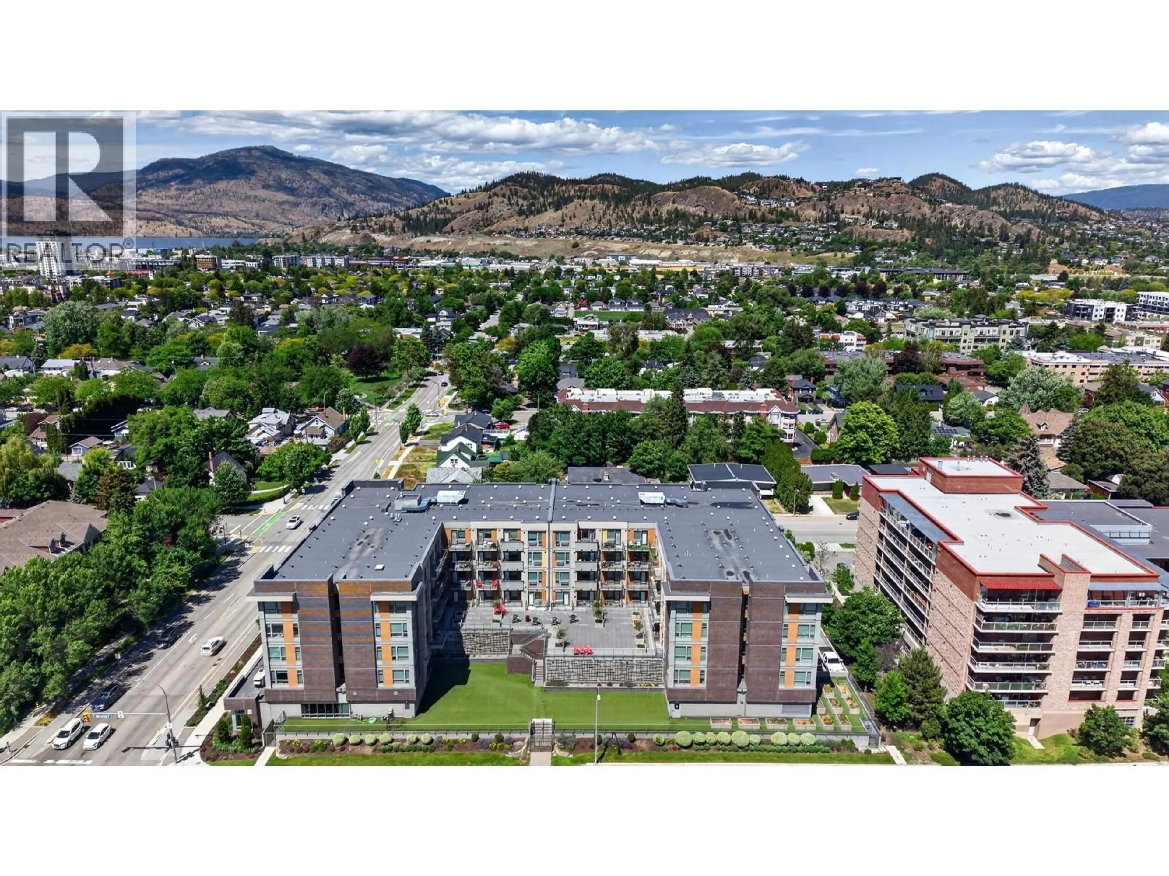 A pic from outside/outdoor area/front of a property/back of a property/a pic from drone, mountain view for 424 - 925 LEON AVENUE, Kelowna British Columbia V1Y0E5