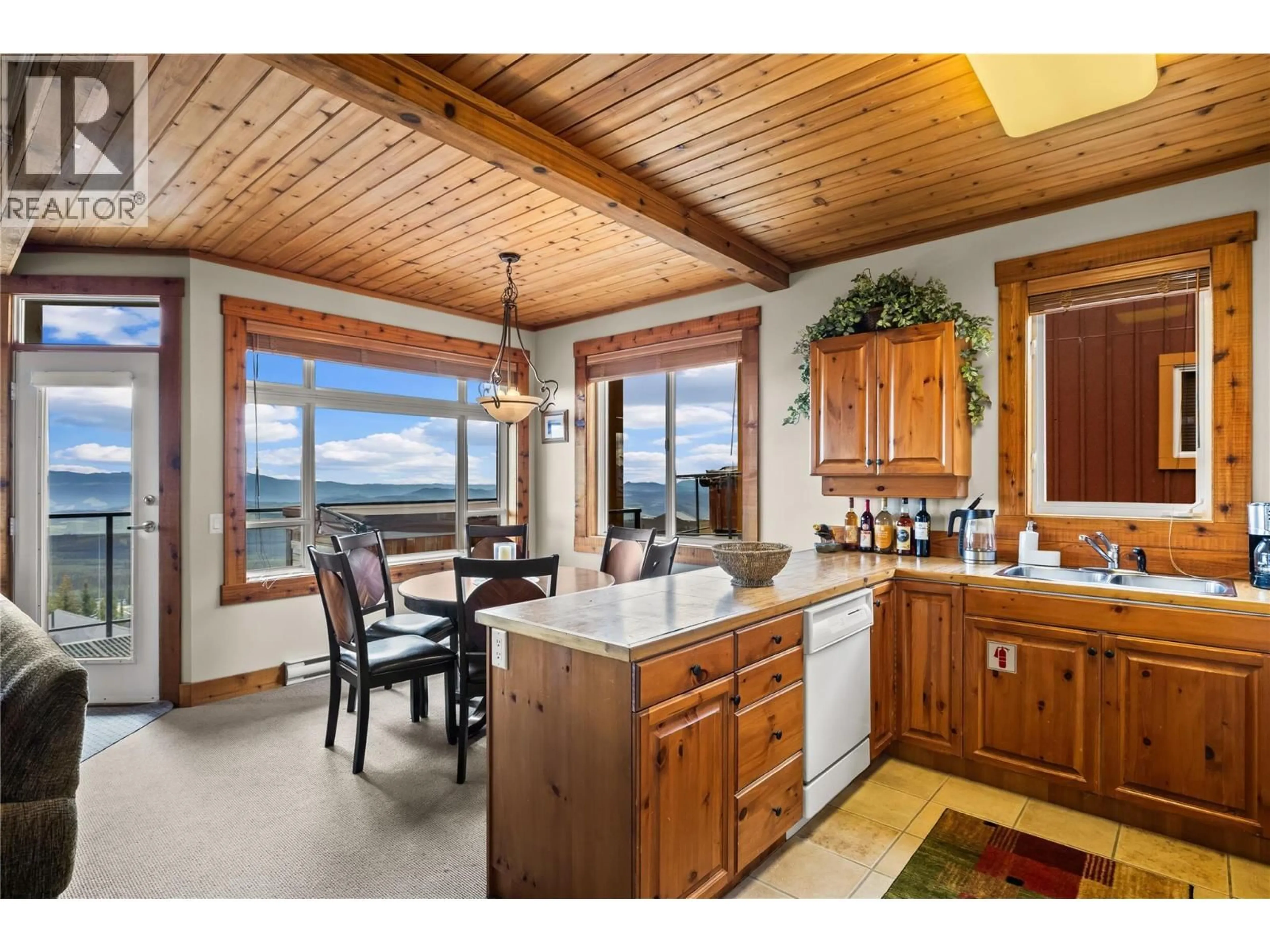 Open concept kitchen, unknown for 16 - 7650 PORCUPINE ROAD, Big White British Columbia V1P1T4