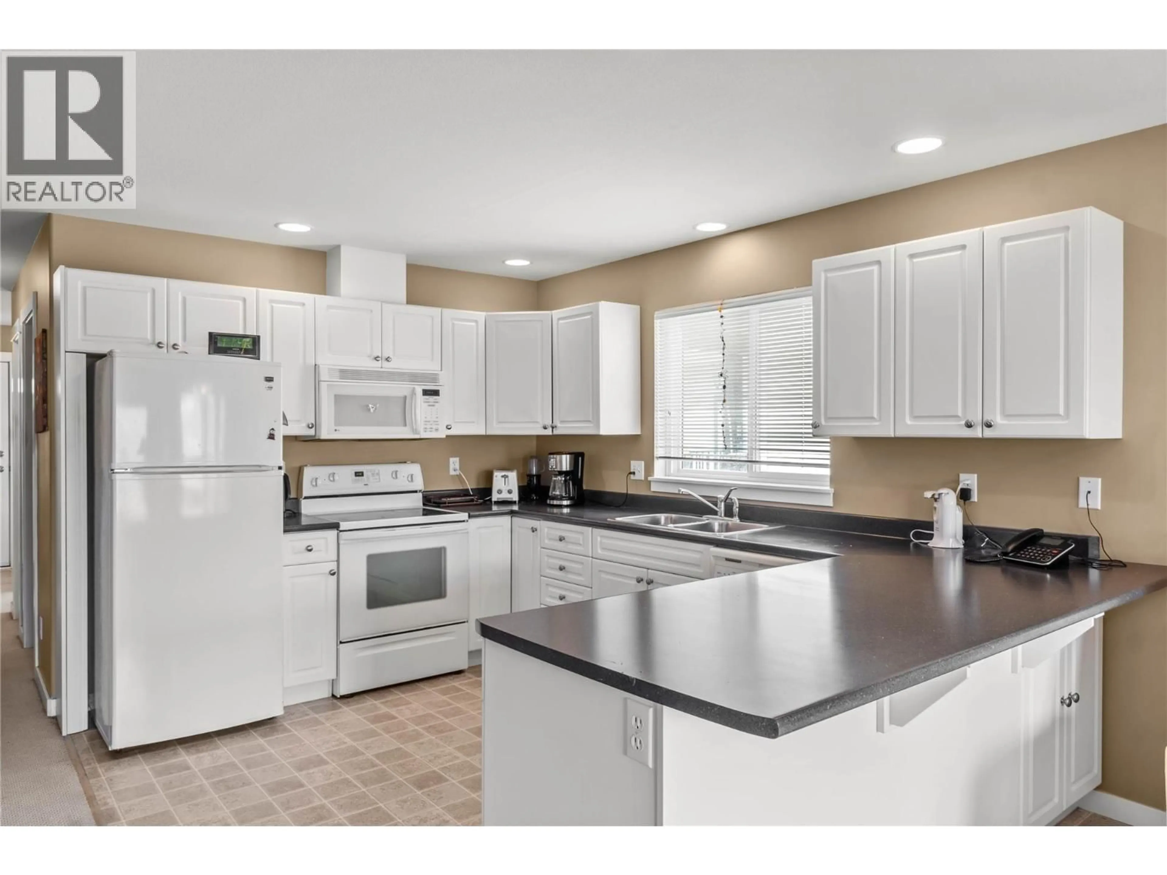 Standard kitchen, ceramic/tile floor for 1914 SNOWBERRY CRESCENT, Kamloops British Columbia V1S1Z8