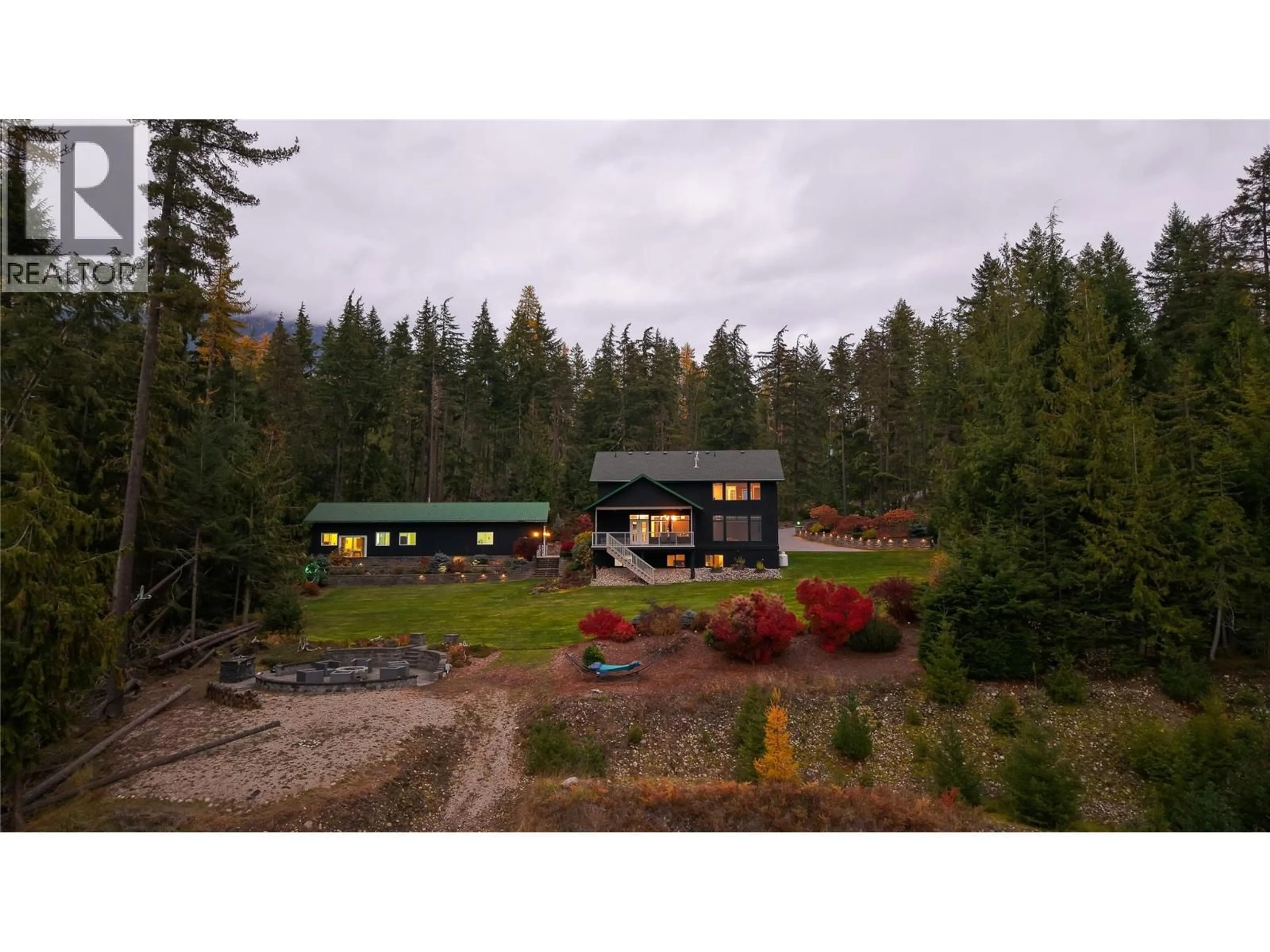 A pic from outside/outdoor area/front of a property/back of a property/a pic from drone, mountain view for 2600 HIGHWAY 23 OTHER NORTH, Nakusp British Columbia V0G1R0