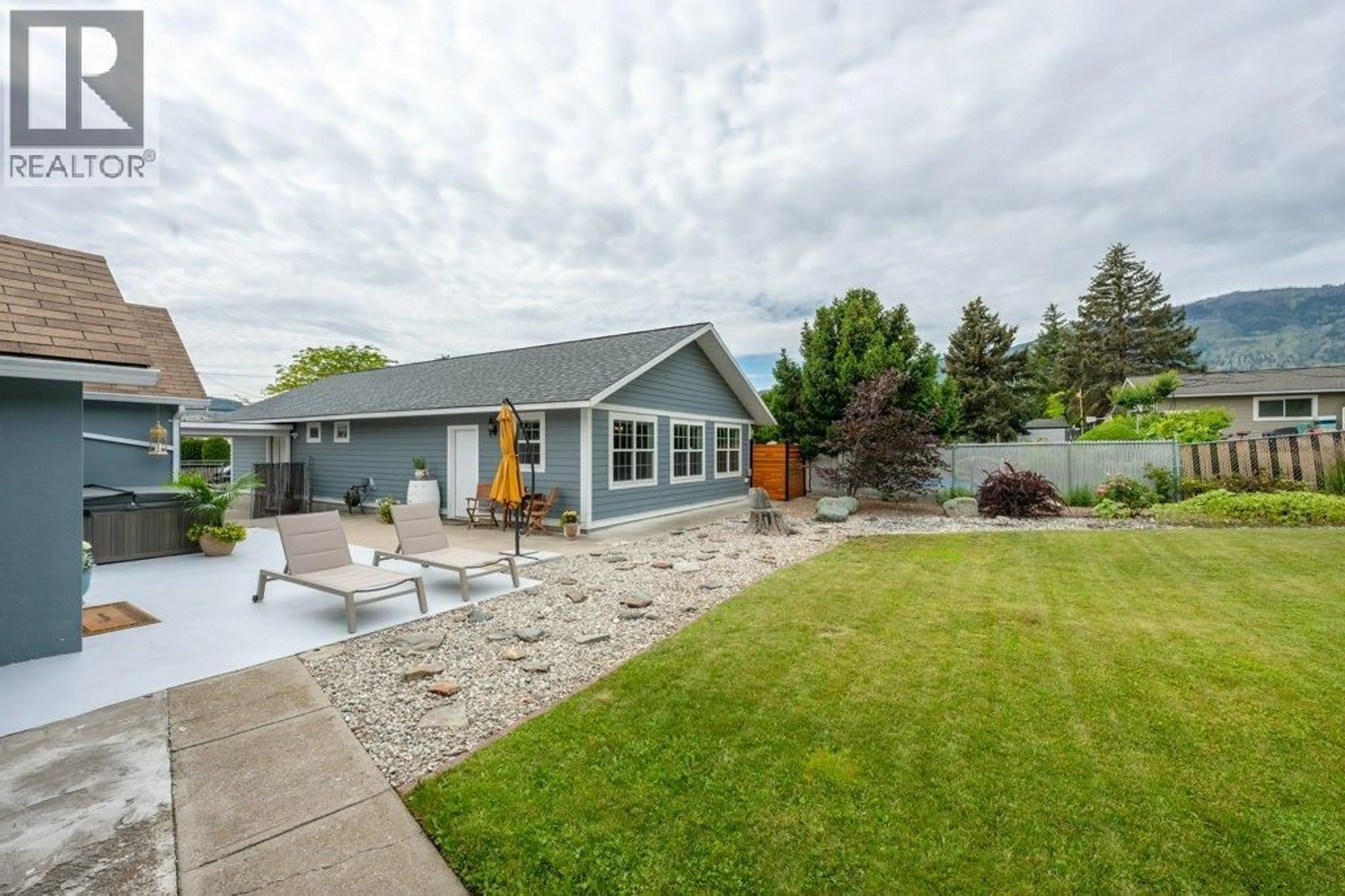 Home with vinyl exterior material, street for 860 FAIRVIEW ROAD, Oliver British Columbia V0H1T6