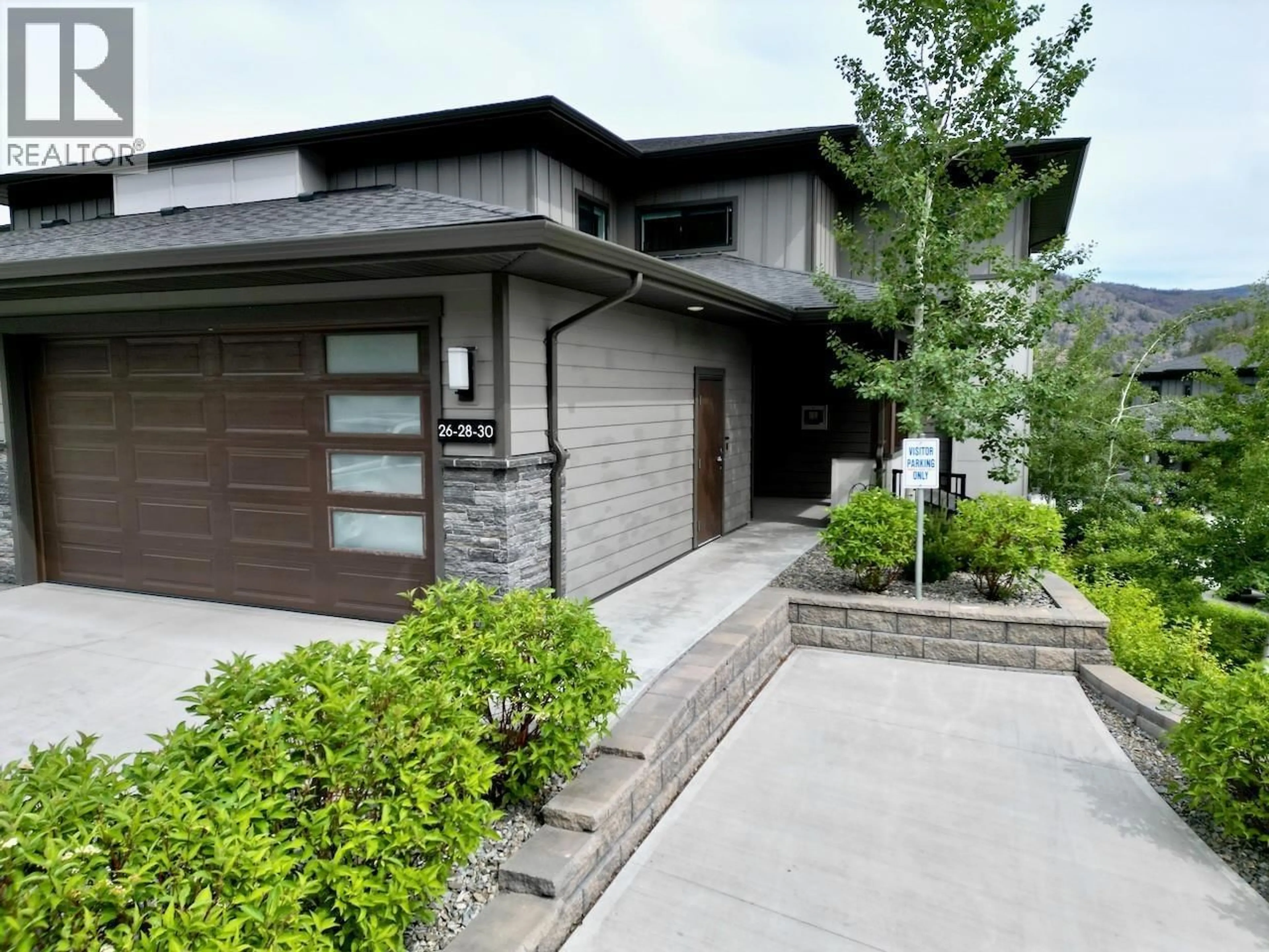 Home with brick exterior material, street for 28 - 2161 UPPER SUNDANCE DRIVE, West Kelowna British Columbia V4T3M9