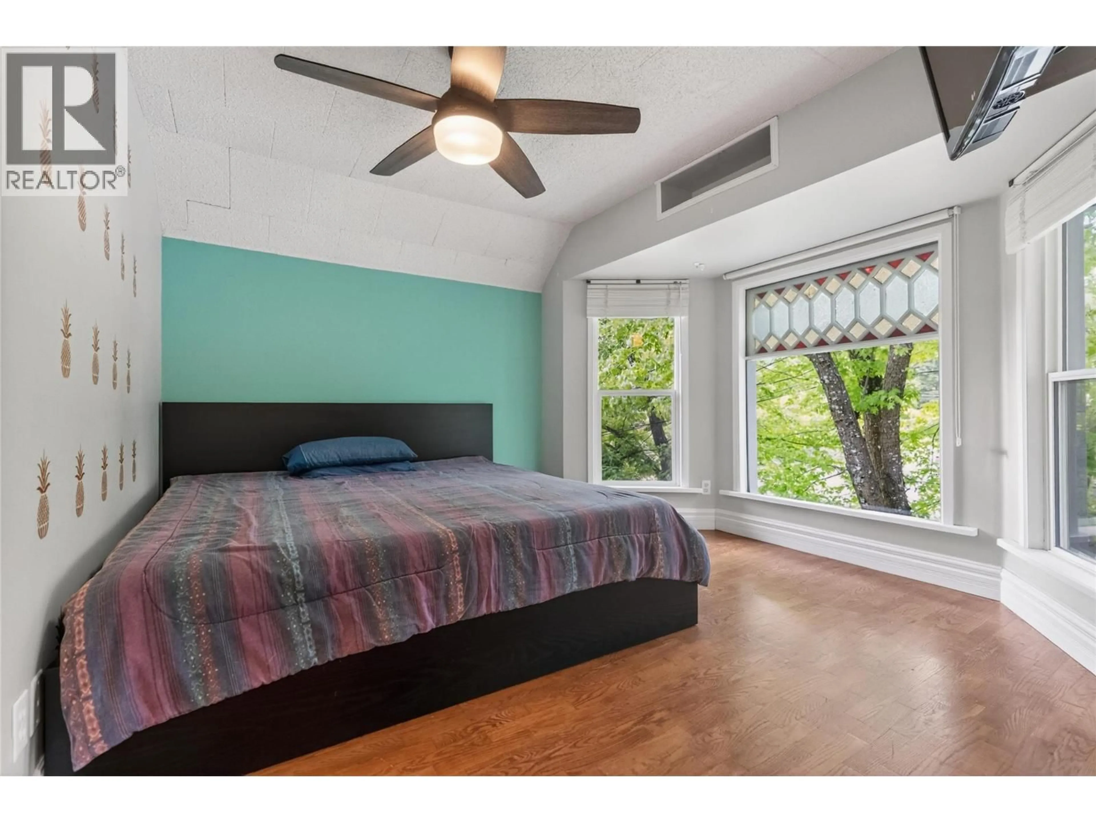 Bedroom with bed, wood/laminate floor for 391 6TH AVENUE, Fernie British Columbia V0B1M0