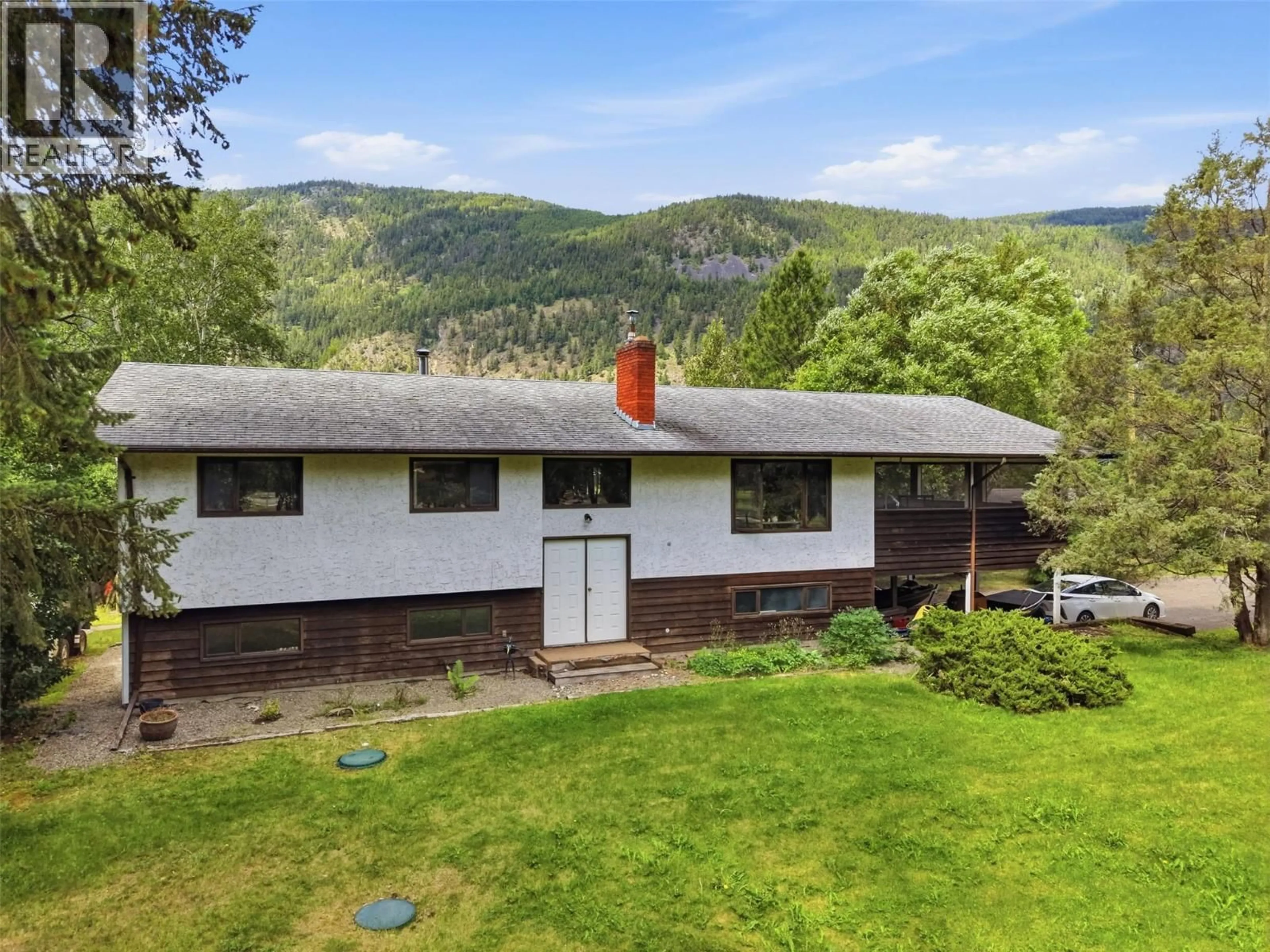A pic from outside/outdoor area/front of a property/back of a property/a pic from drone, mountain view for 216 MCLURE FERRY ROAD, McLure British Columbia V0E1E0