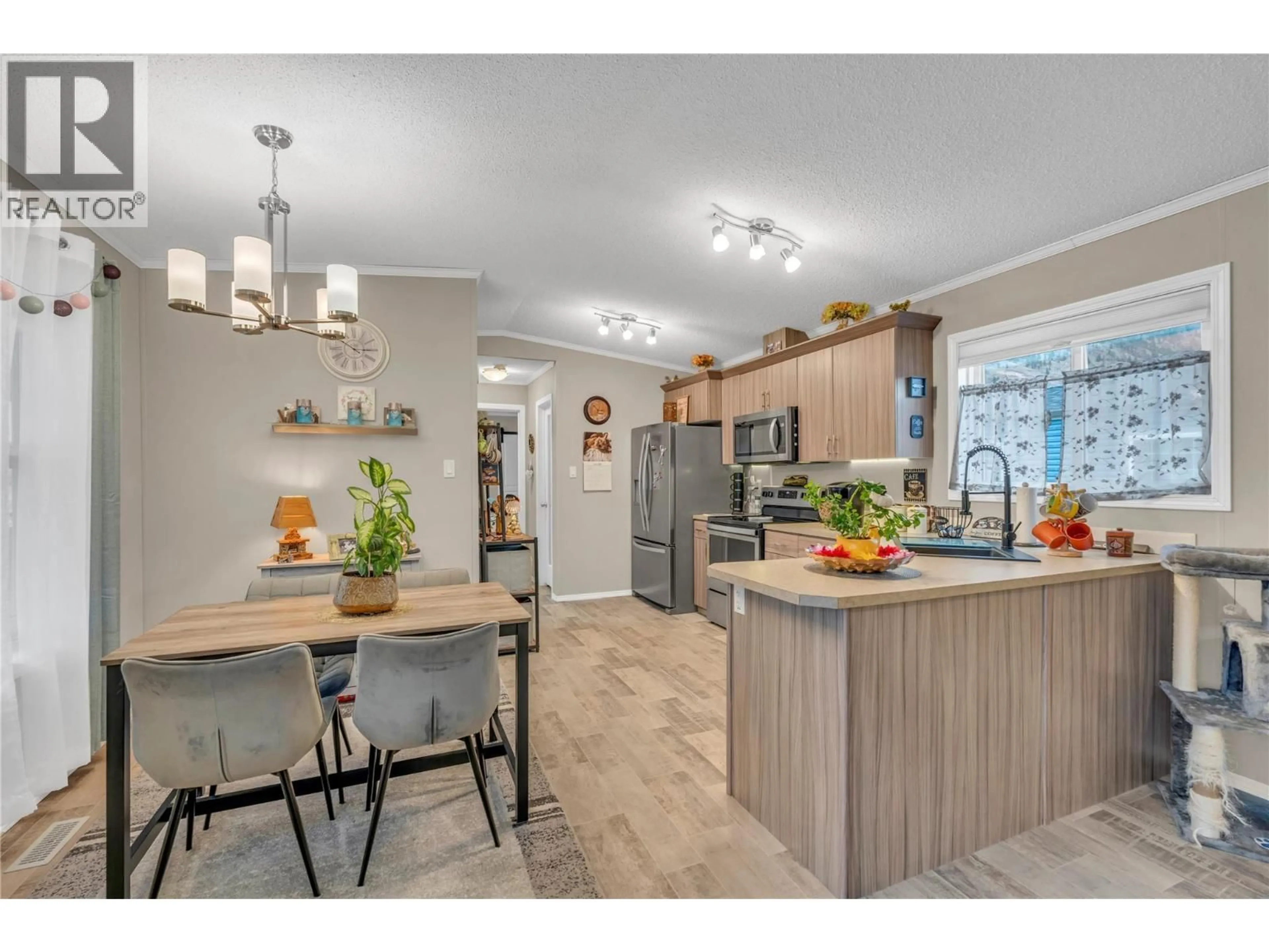 Open concept kitchen, wood/laminate floor for 5 - 1118 MIDDLE BENCH ROAD, Keremeos British Columbia V0X1N2