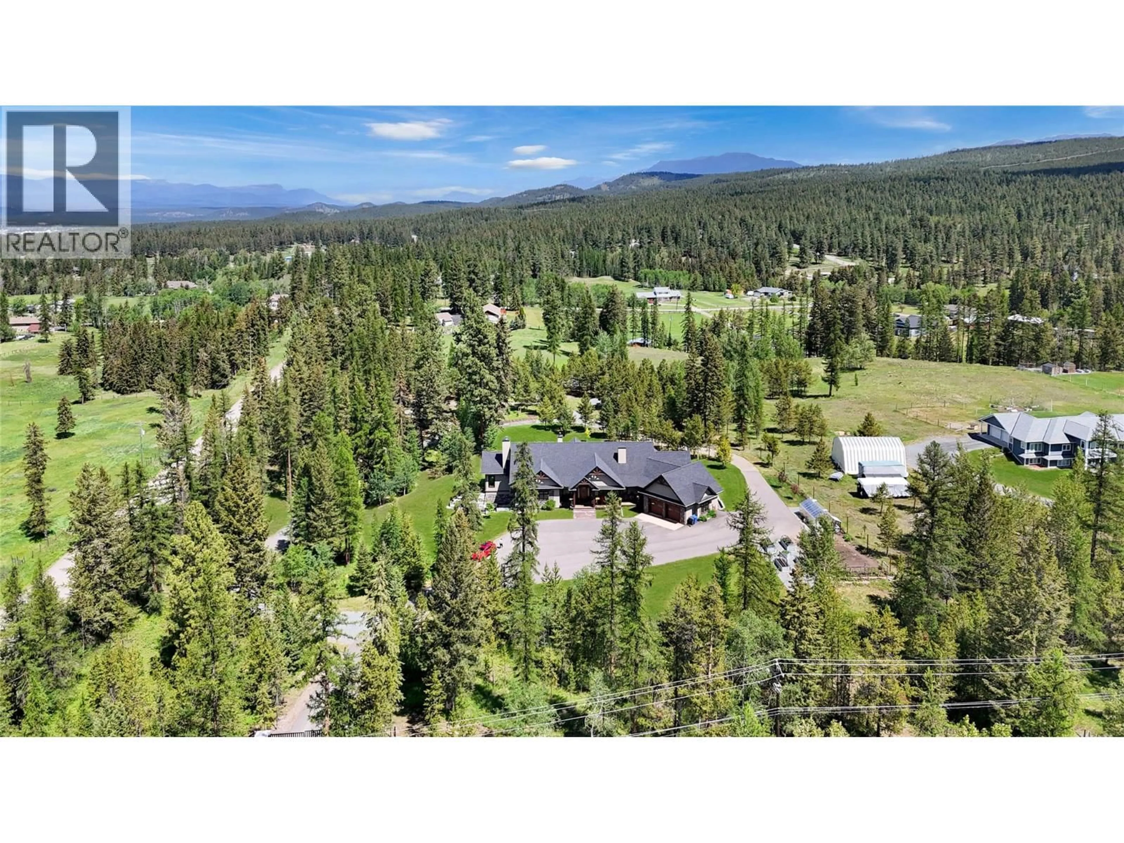 A pic from outside/outdoor area/front of a property/back of a property/a pic from drone, forest/trees view for 4230 21ST STREET SOUTH, Cranbrook British Columbia V1C7A7