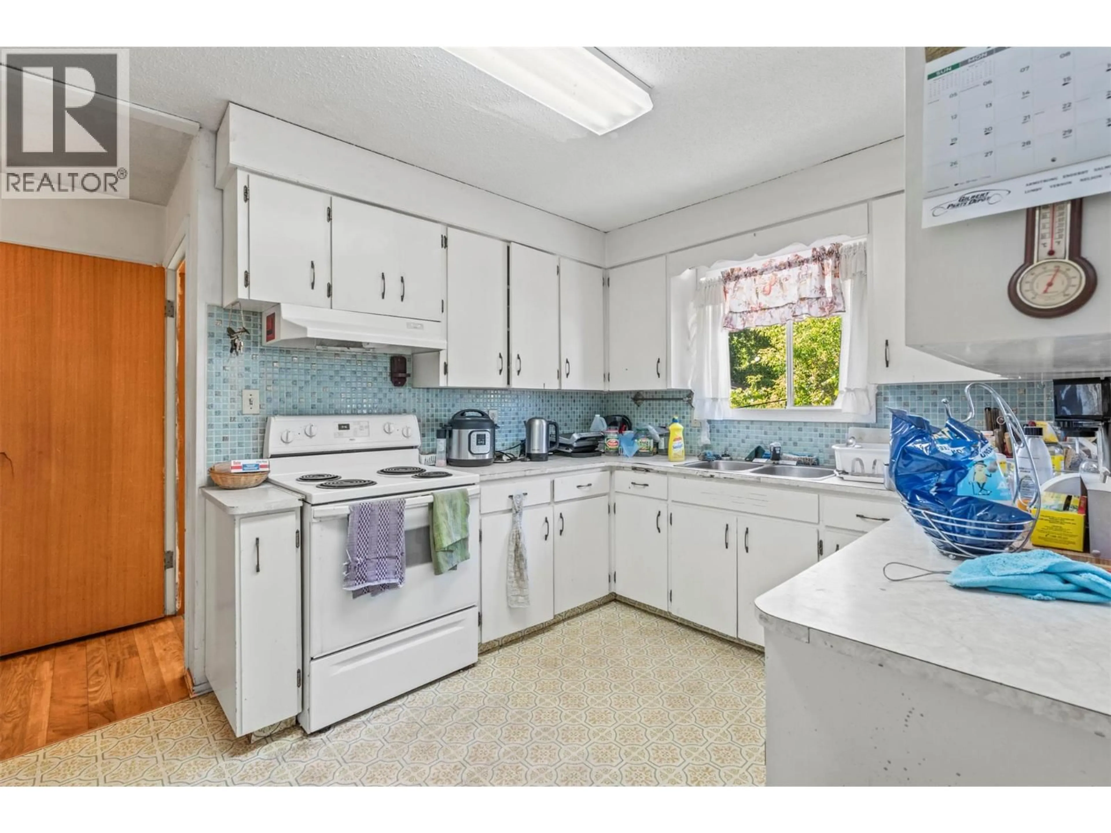 Standard kitchen, ceramic/tile floor for 3706 24 AVENUE, Vernon British Columbia V1T1L9