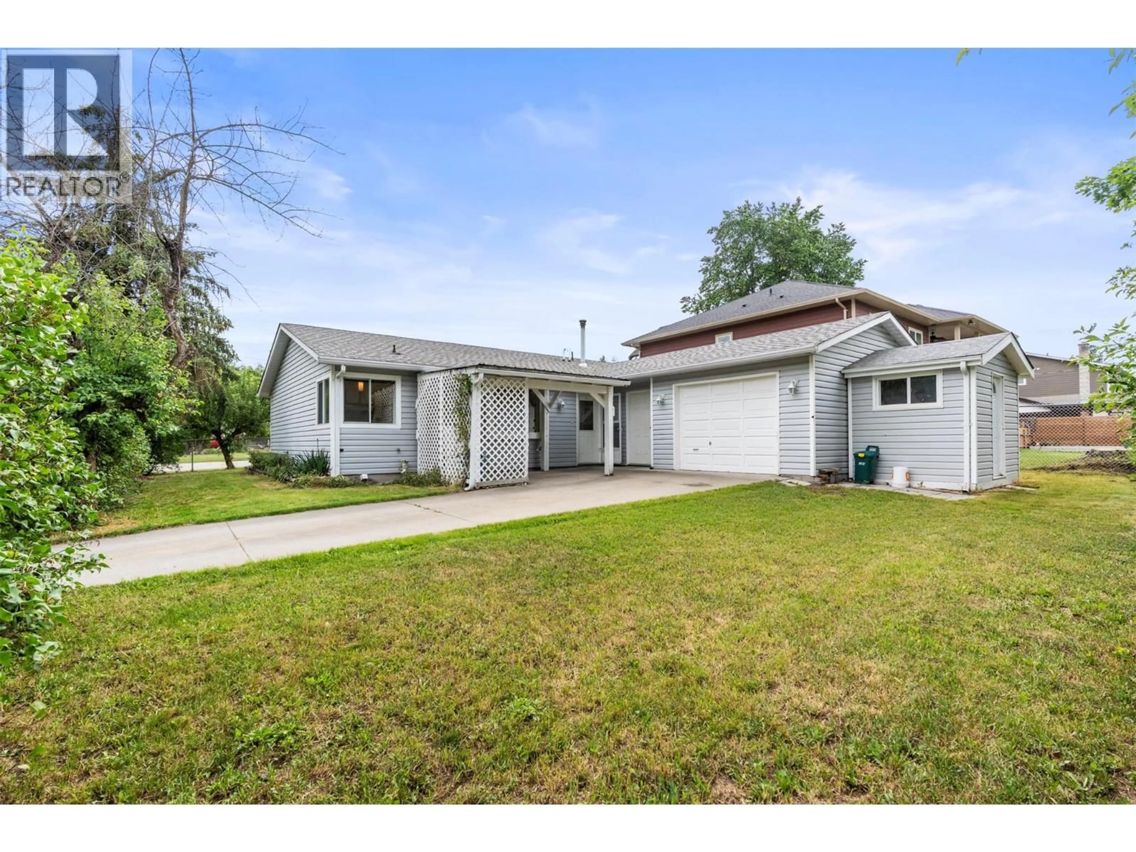Home with vinyl exterior material, street for 2820 BURNS AVENUE, Armstrong British Columbia V4Y0G3