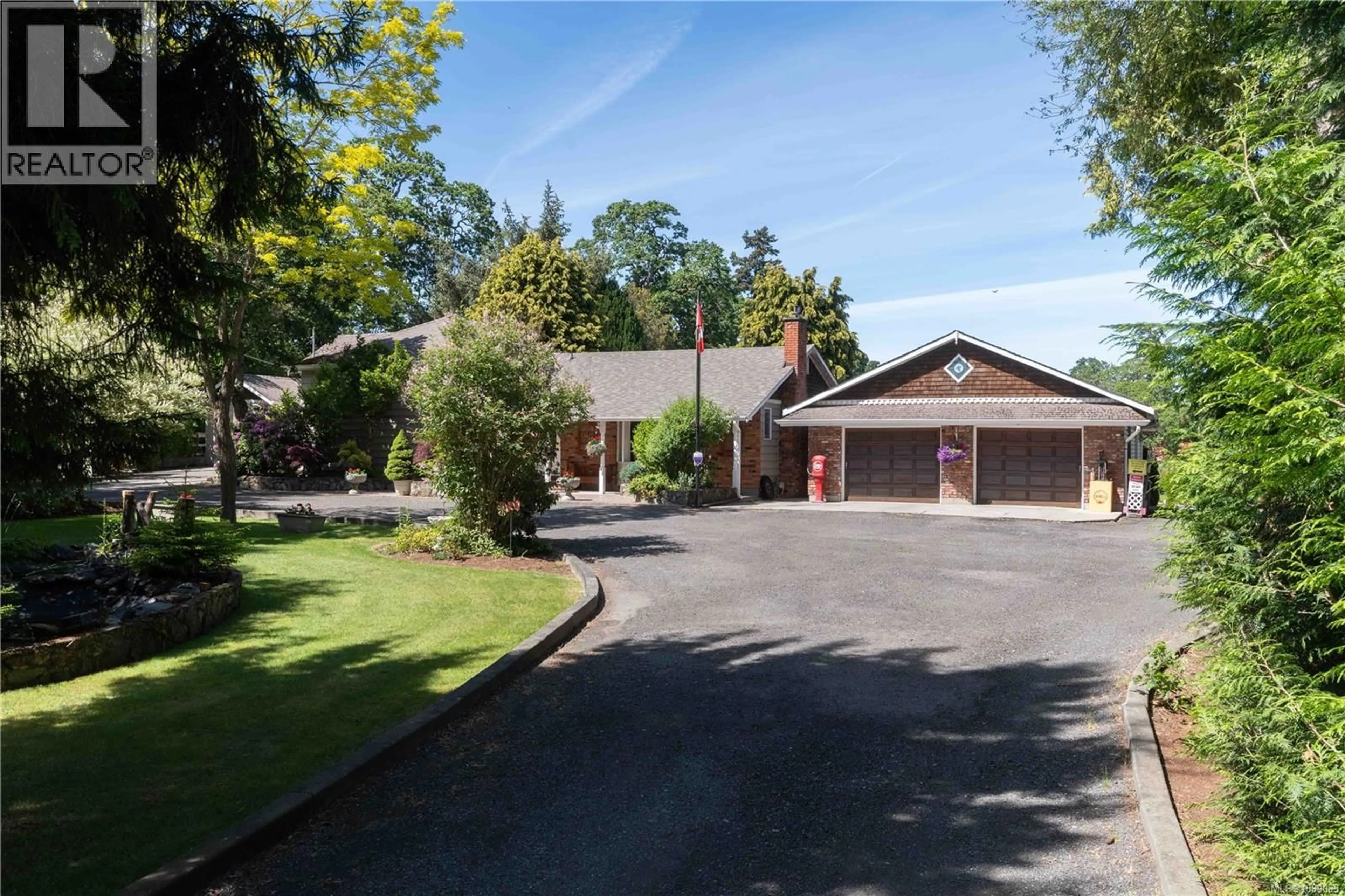 A pic from outside/outdoor area/front of a property/back of a property/a pic from drone, street for 1568 BURNSIDE ROAD WEST, Saanich British Columbia V9E2E2