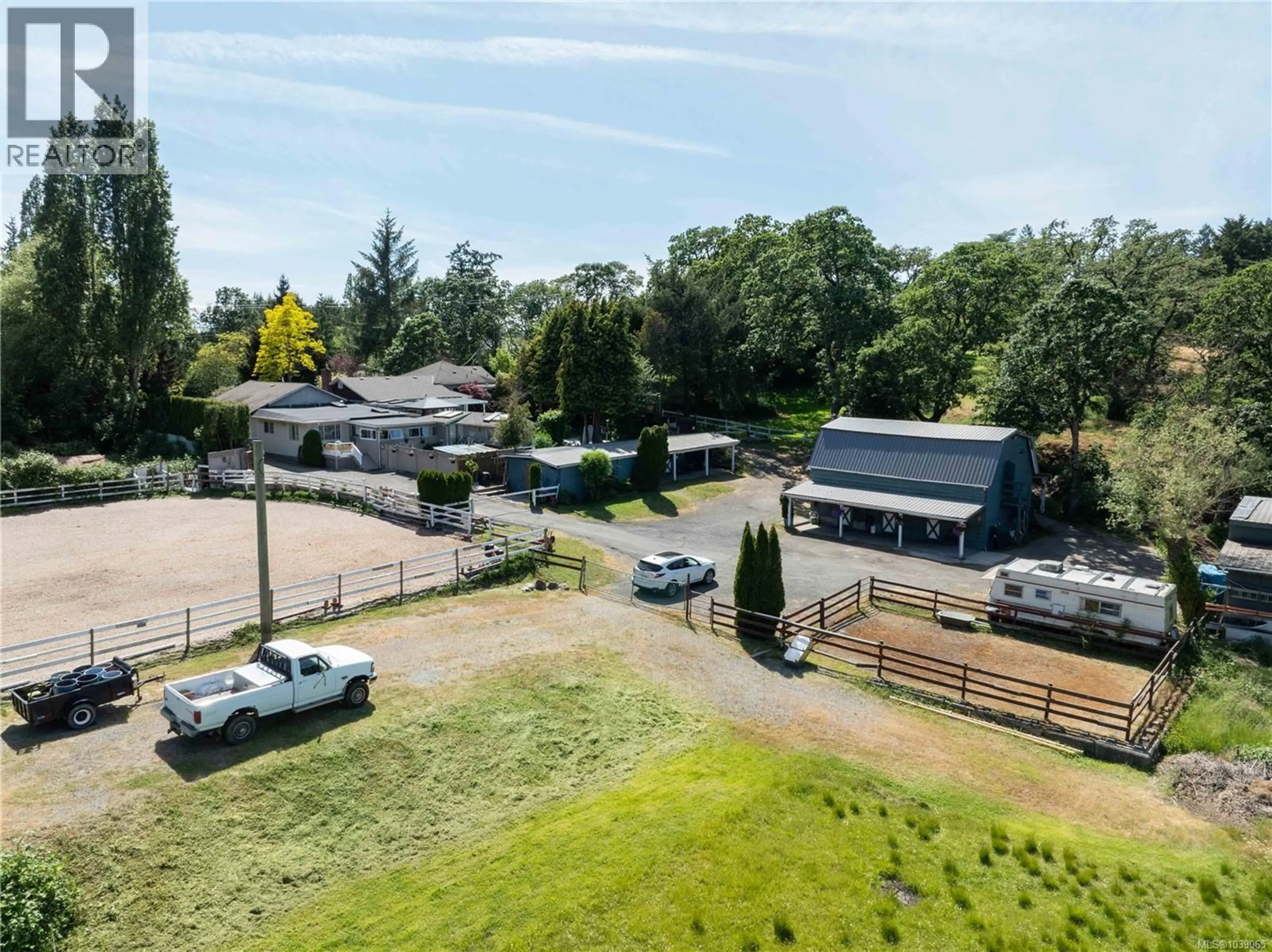 A pic from outside/outdoor area/front of a property/back of a property/a pic from drone, unknown for 1568 BURNSIDE ROAD WEST, Saanich British Columbia V9E2E2
