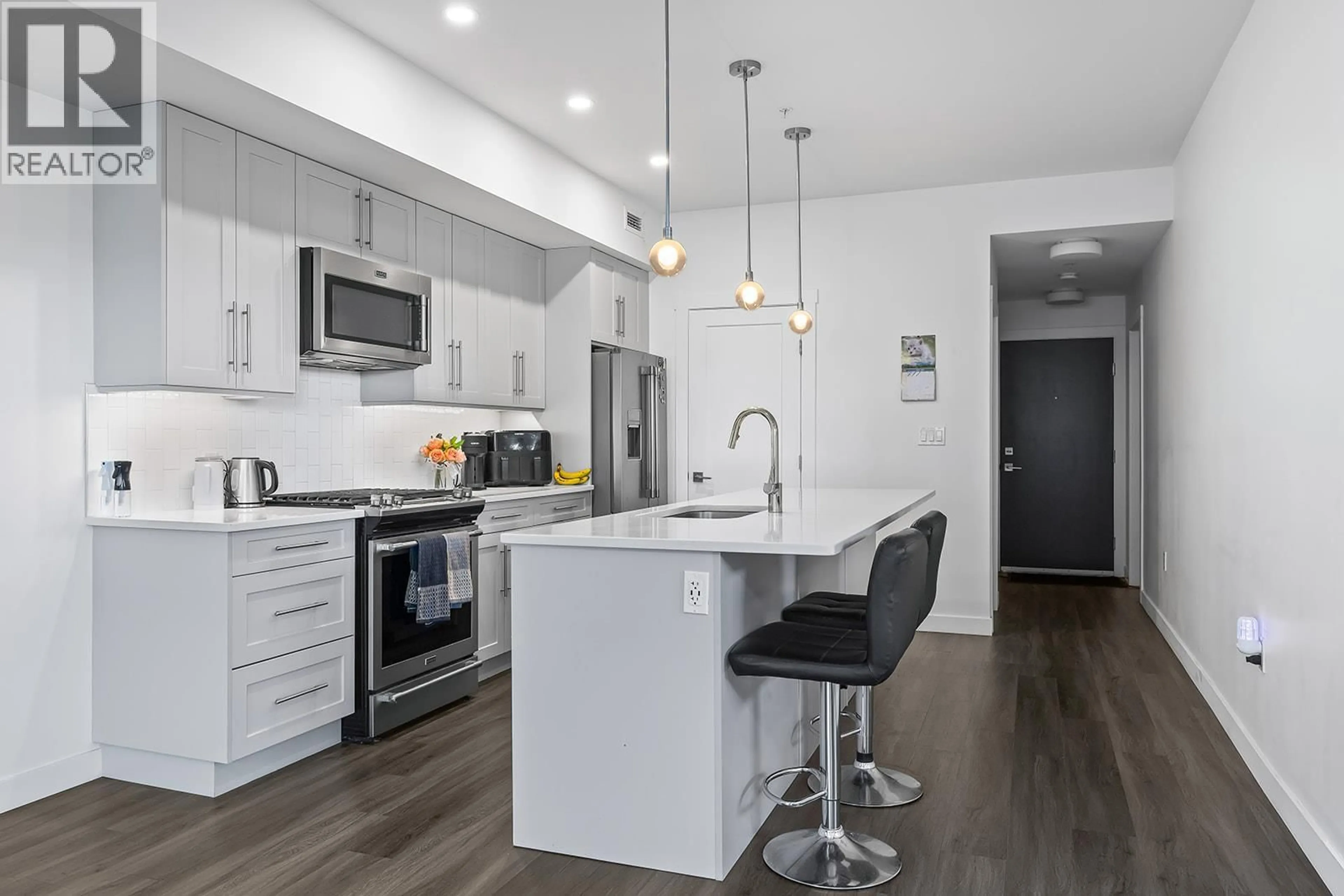 Open concept kitchen, unknown for 305 - 3630 MISSION SPRINGS DRIVE, Kelowna British Columbia V1W0B2