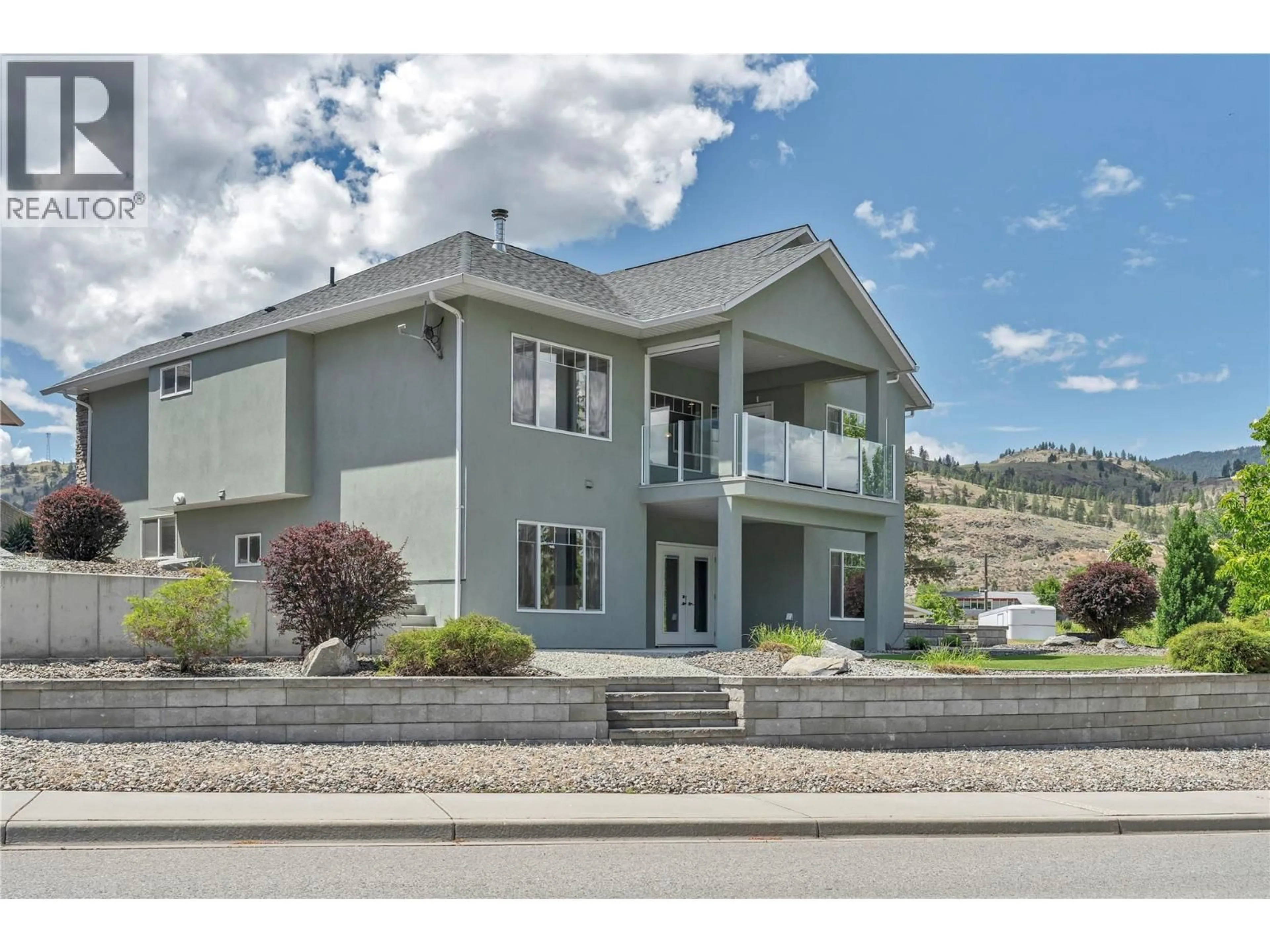 Home with vinyl exterior material, mountain view for 6991 PINOT PLACE, Oliver British Columbia V0H1T4