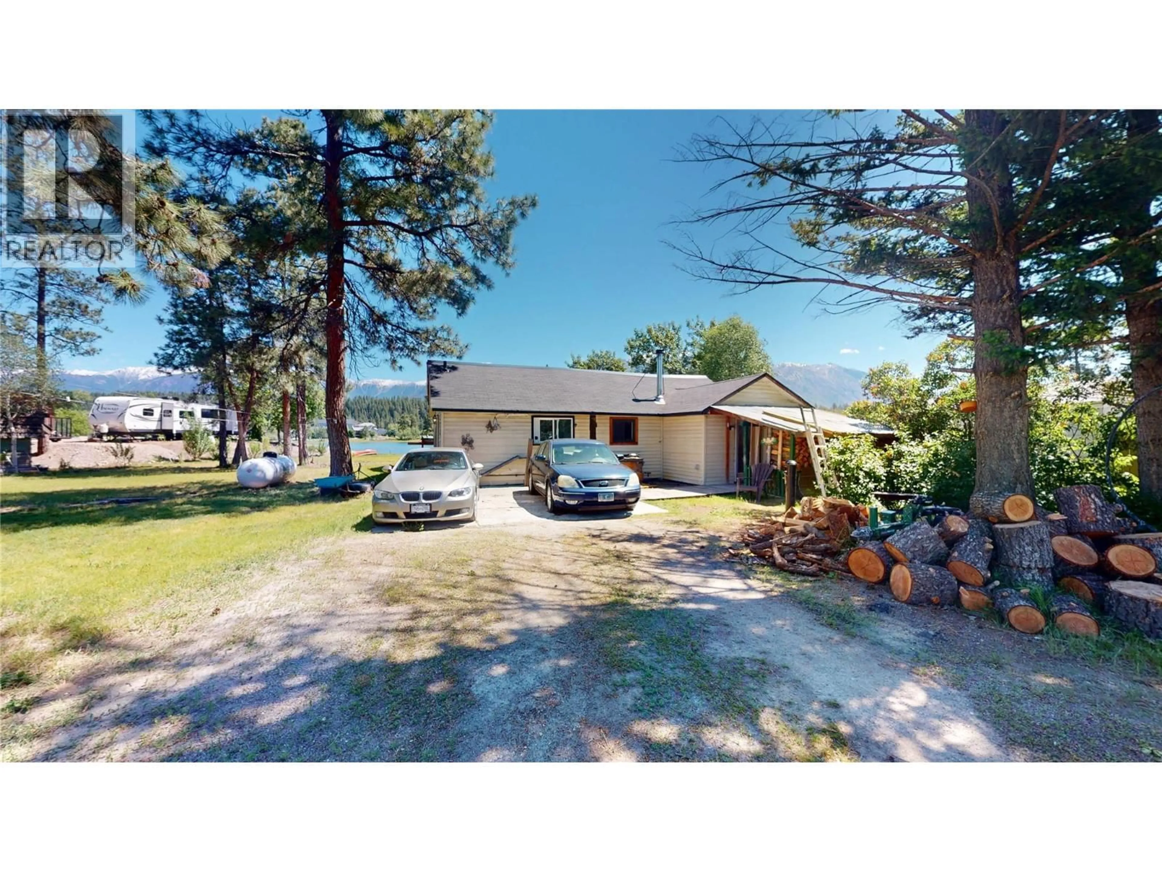 A pic from outside/outdoor area/front of a property/back of a property/a pic from drone, street for 6604 DOGWOOD ROAD, Wasa British Columbia V0B2K0